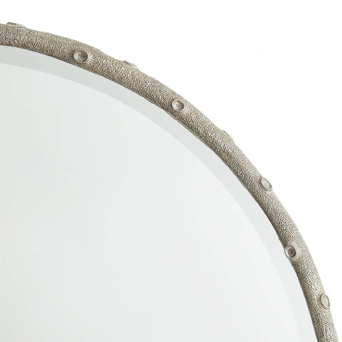 Round pearl finish coral cast aluminum frame wall mirror with a circular beveled glass plate.

Dimensions: 42