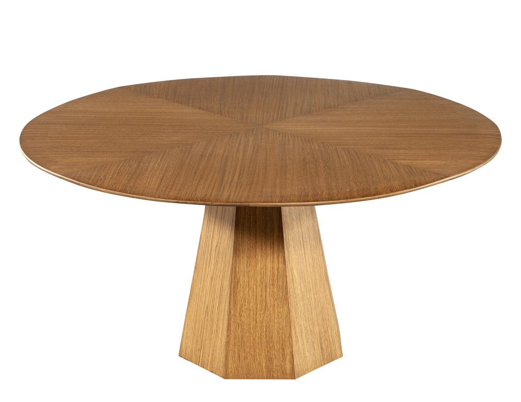 Introducing the perfect addition to your dining room - the Modern round oak dining table from Carrocel. Hand crafted by our skilled artisans, this dining table boasts stunning textured oak wood grains that will add a touch of natural beauty to any