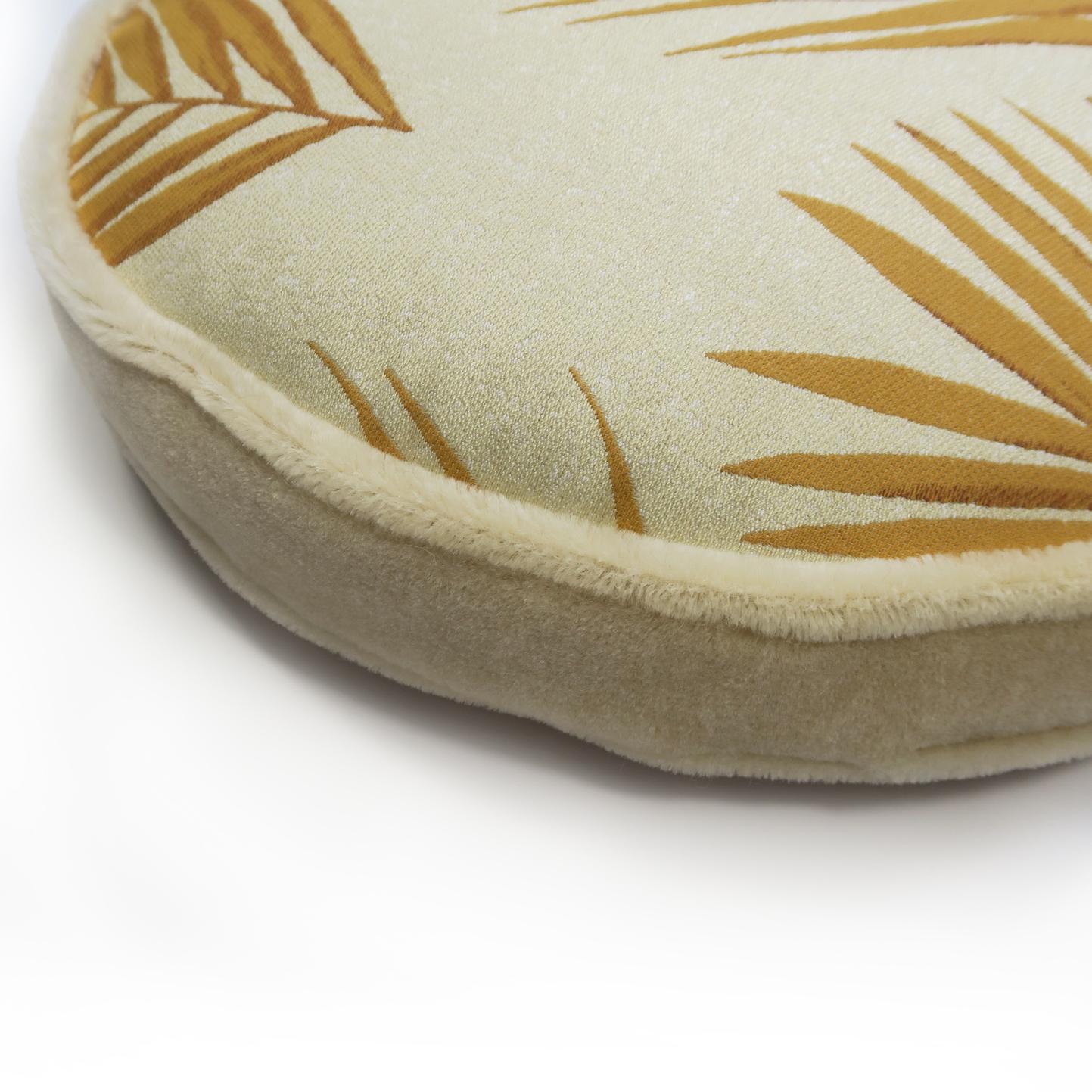 A tropical pattern in subtle tones, our Bamboo Leaf fabric upholstery is warm and playful. Harking to a different environment, the cushion helps to bring a natural look to both interior and exterior settings. In its rounded shape and yellow hue,