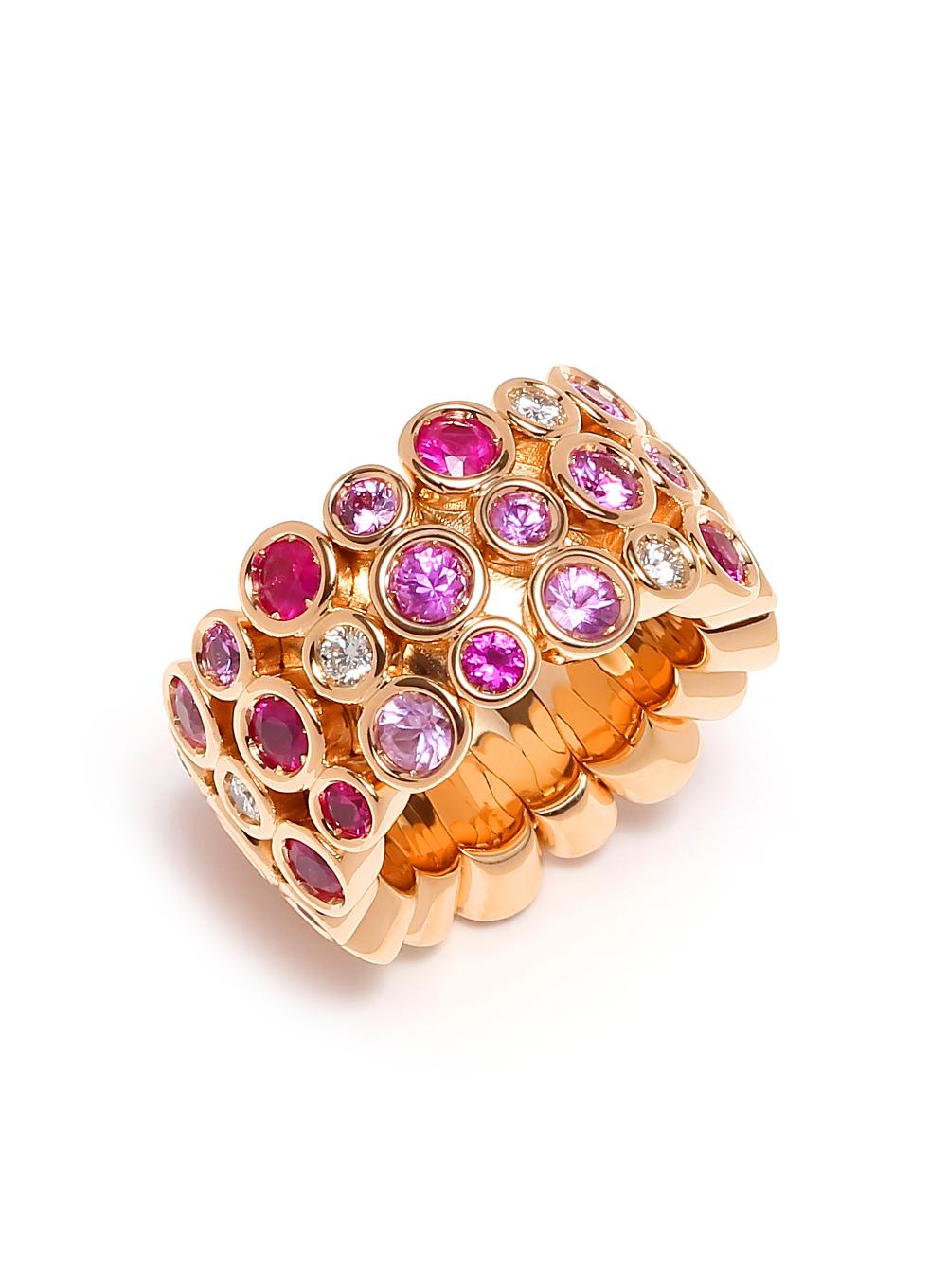 Multi Color Pink Ombre Eternity Patterns Ring

Purple Pink Rose Sapphire Diamond Bezel Eternity Band 18 Karat Rose Gold Ring

Jewels inspired by the colourful Art Deco movement. Lively designs and colorful Interpretations in a triple row eternity