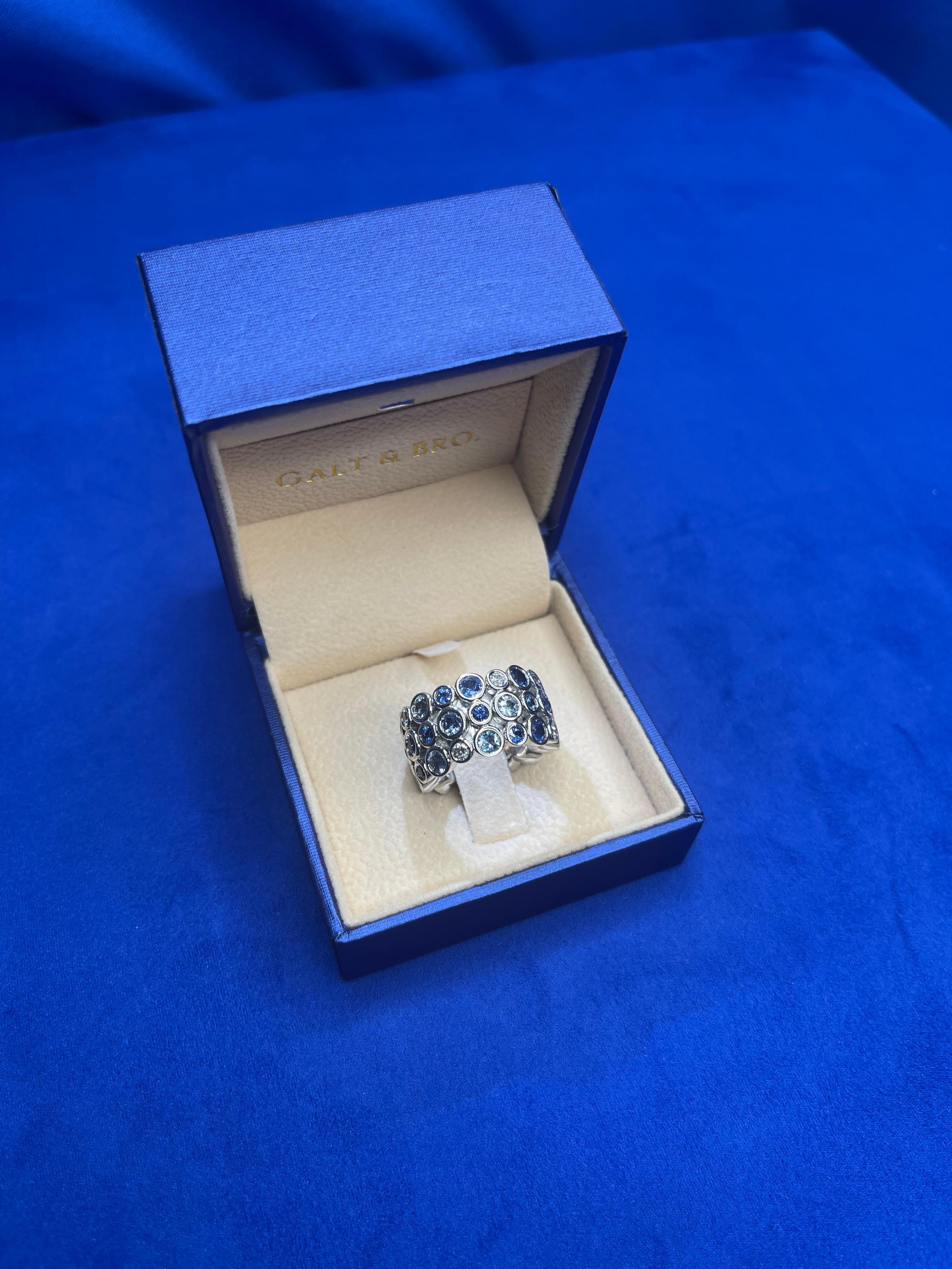Modern Blue Sapphire Sky Topaz Diamond Flexible Bezel Eternity 18K White Gold Ring Band For Sale