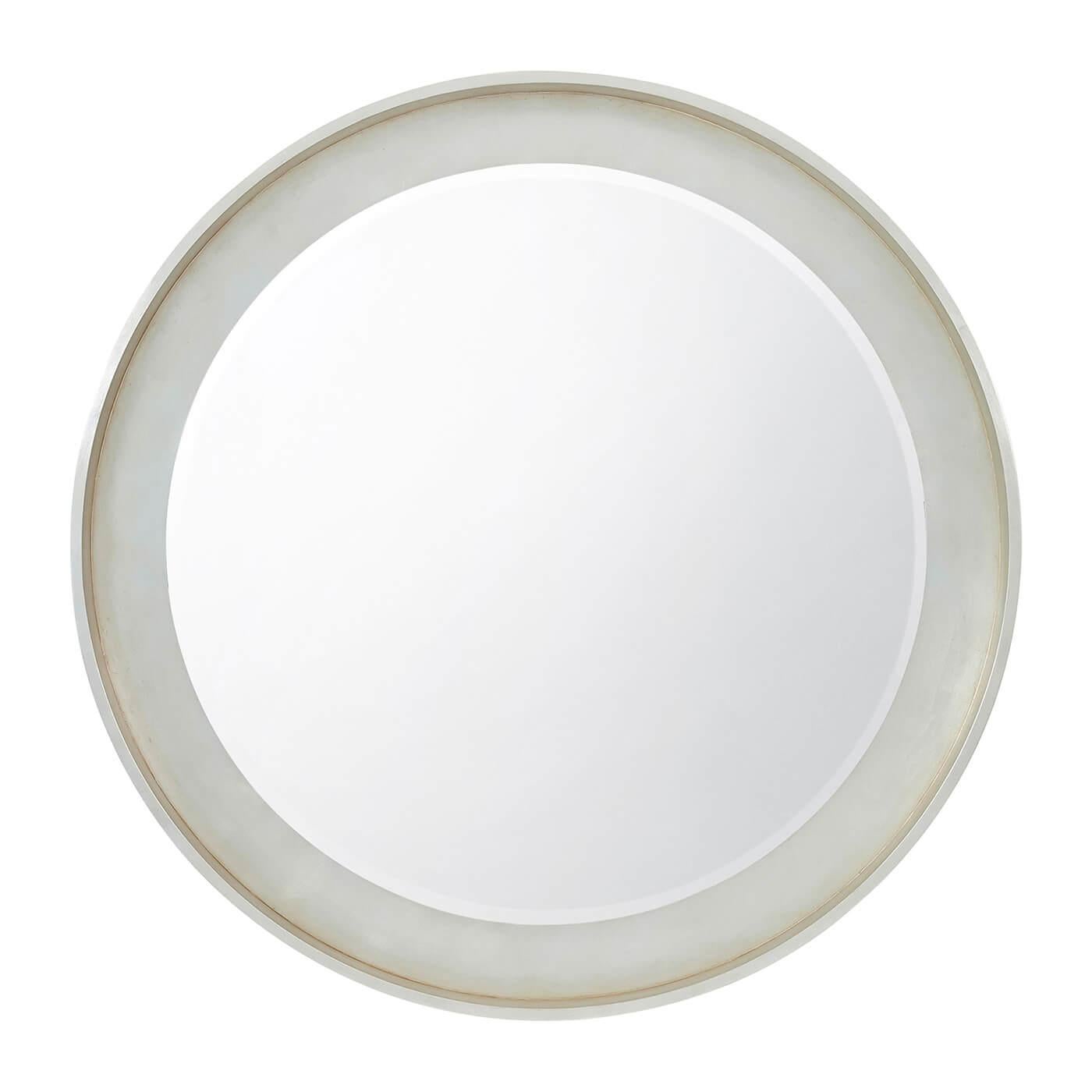 Modern silver leaf molded edge mirror with a floating bevelled edge mirror plate.

Dimensions: 54