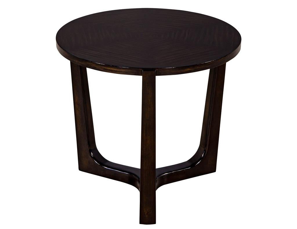Modern round walnut side table with geometric inlay. Finished in a rich semi-gloss espresso color with beautiful reverse diamond inlay pattern.

Price includes complimentary scheduled curb side delivery service to the continental USA.