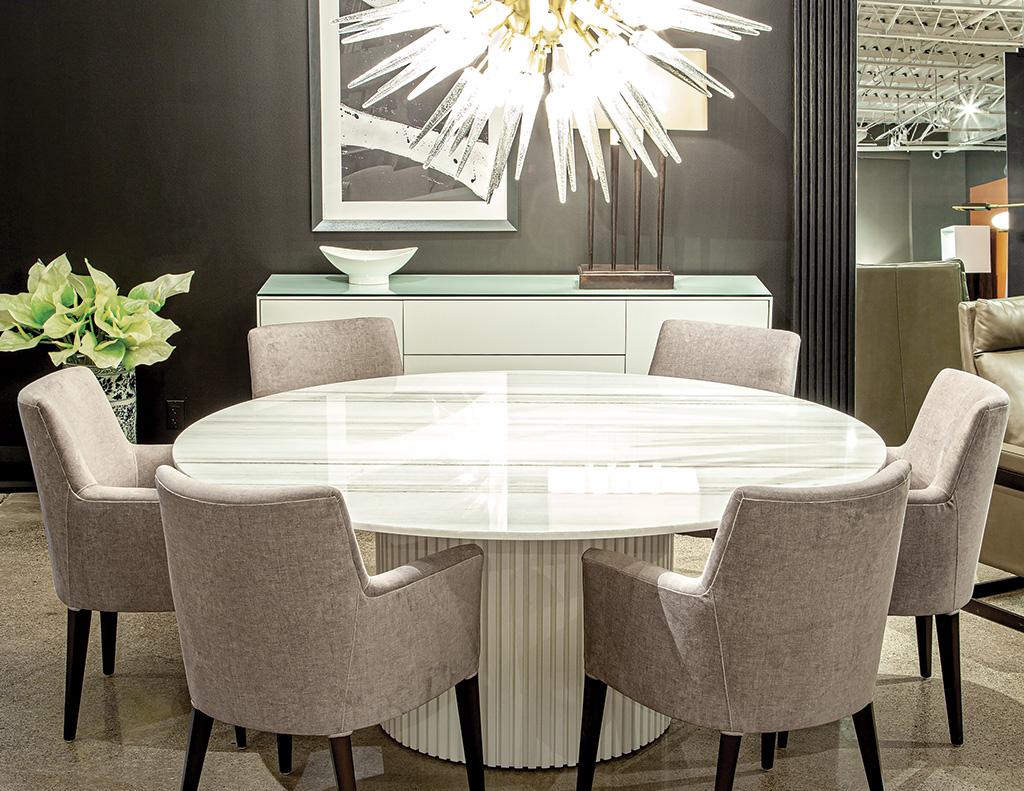 Custom Round White Marble Top Dining Table. Beautiful Italian marble with hand crafted pedestal. Featuring clean contemporary tambour pedestal in satin white lacquer finish. Italian marble top has beautiful veining variations of white, greys and