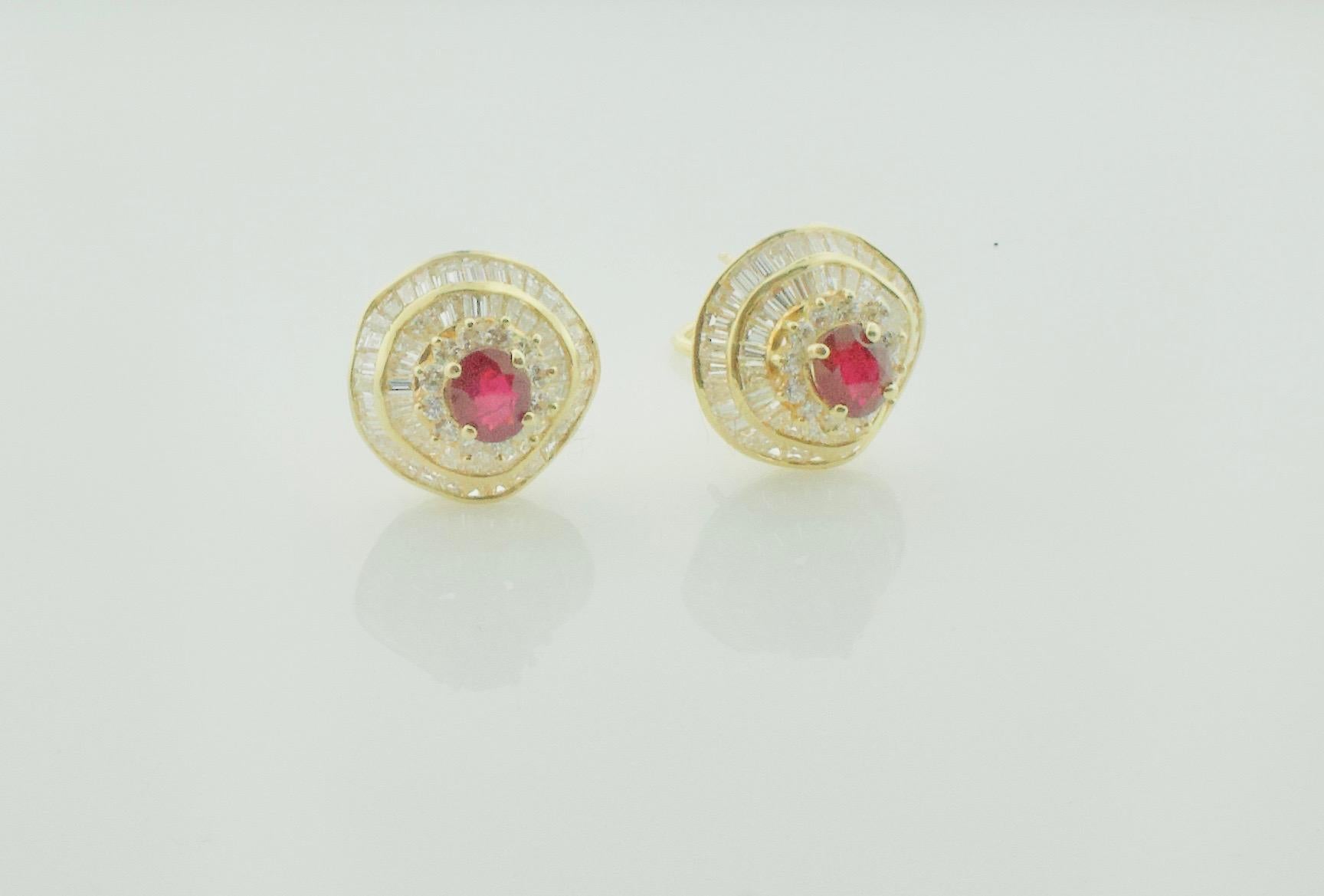 Modern Ruby and Diamond Earrings in 18k Yellow Gold
Two Oval Rubies  Weighing 2.58 Carats [bright with no imperfections visible to the naked eye] 
112 Tapered Baguette Cut Diamonds Weighing 4.95 Carats Approximately 
24 Round Brilliant Cut Diamonds