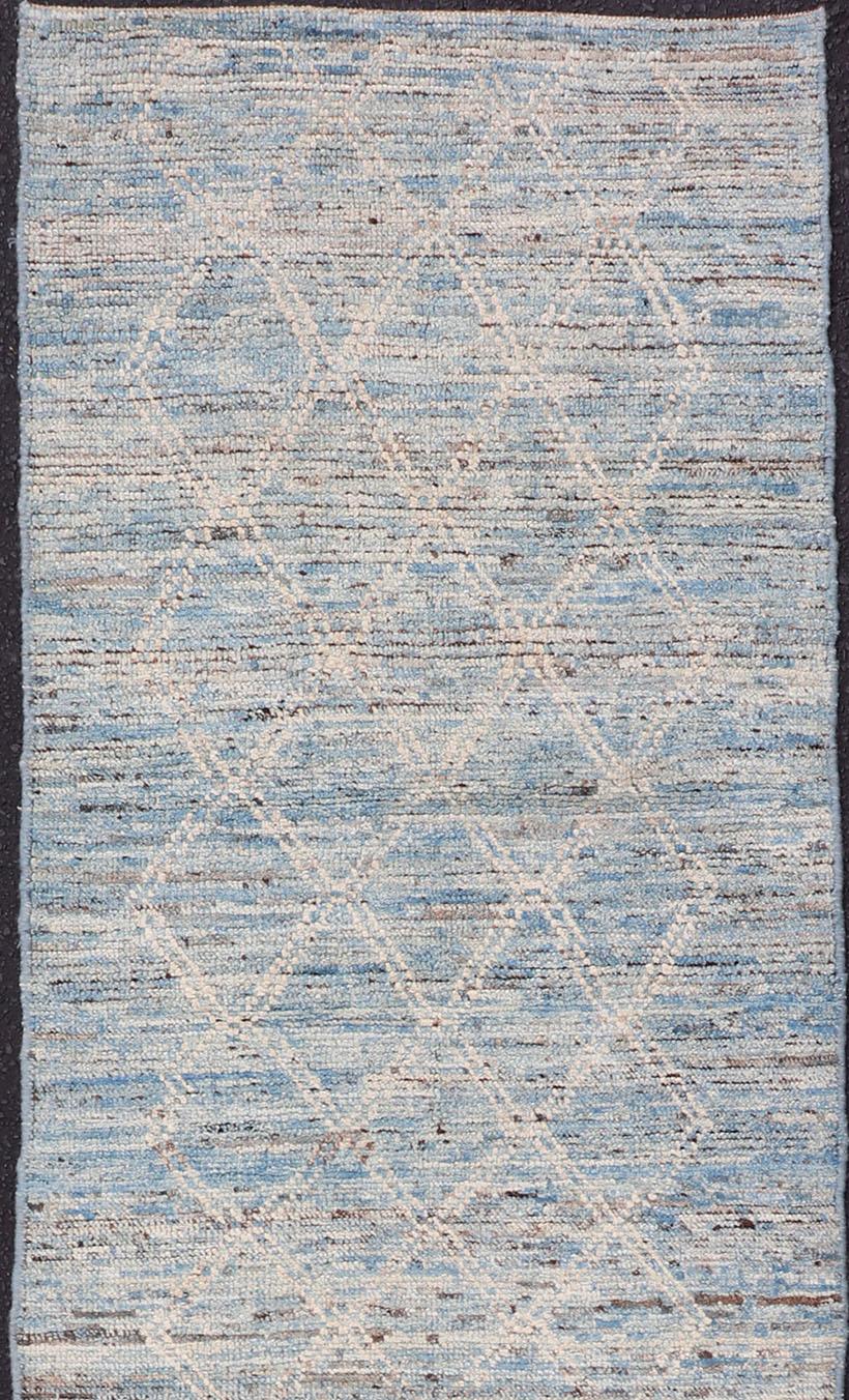 Cream and sky blue variegated tribal design modern rug, rug AFG-33328, country of origin / type: Afghanistan / Modern, condition: new. Keivan Woven Arts 

This brand new rug features a Afghan tribal design and luscious wool. The color palette