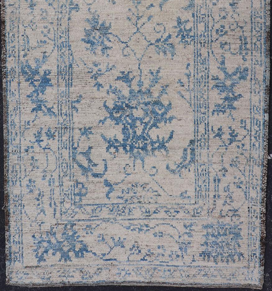 Cream and blue variegated tribal design modern rug, Keivan Woven Arts/rug AFG-36120, country of origin / type: Afghanistan / Modern, condition: New

Measures: 3'6 x 8'5

This brand new rug features a Afghan traditional design and luscious wool.
