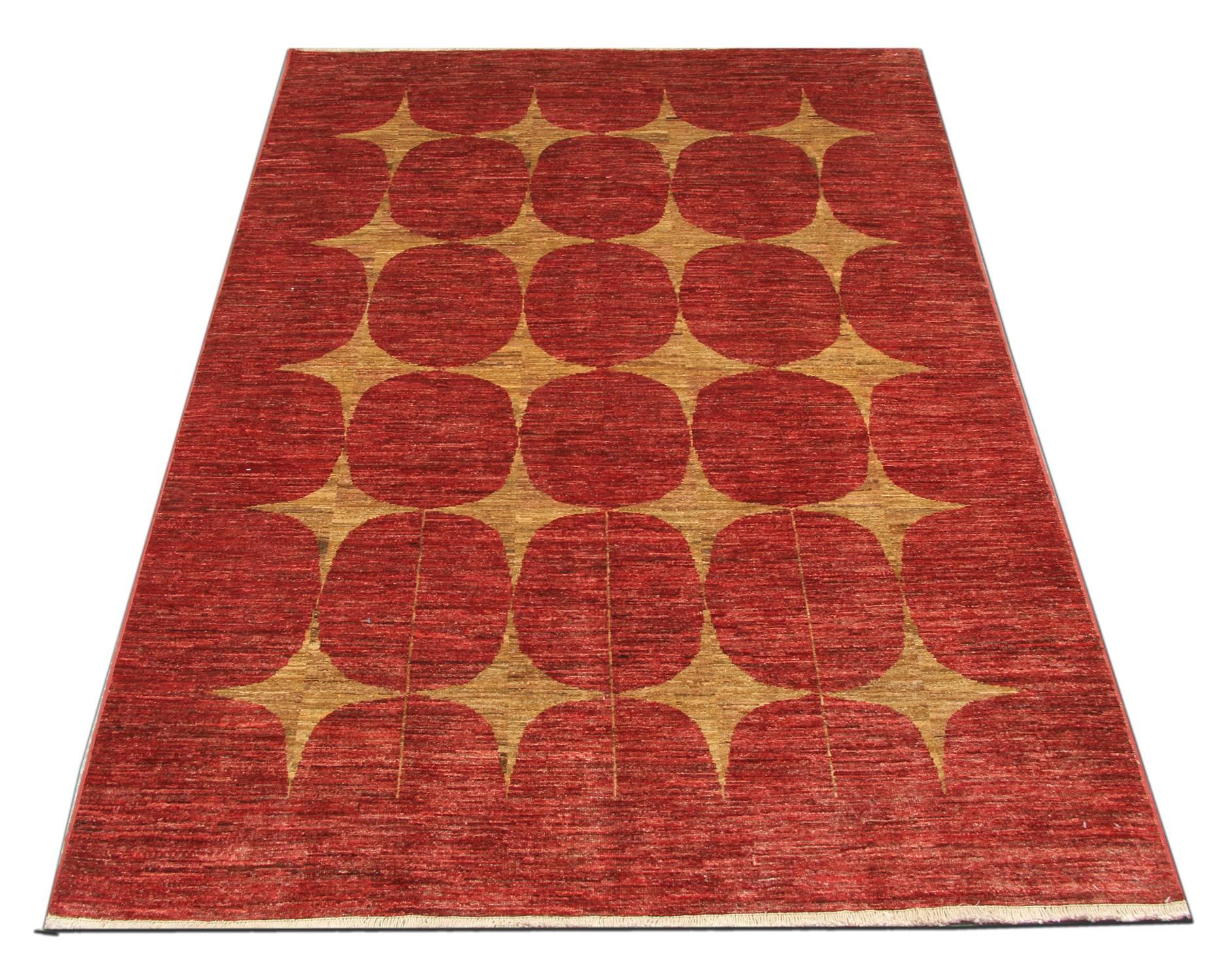 With rich colours and abstract elements, this woven rug gives a subtle contemporary appearance. The geometric carpet features beautiful rust and gold colour. This deep red rug is grounded in stylish colours that will add a touch of modernized