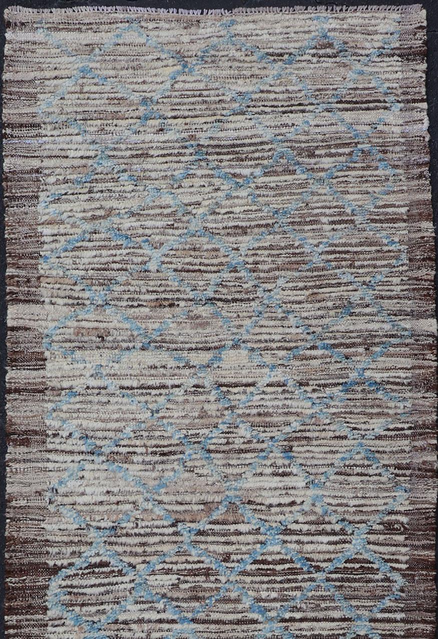Cream, brown, and sky blue variegated tribal design modern runner, rug AFG-36110, Keivan Woven Arts country of origin / type: Afghanistan / Modern, condition: new.

This brand new rug features a tribal modern design and luscious wool. The color