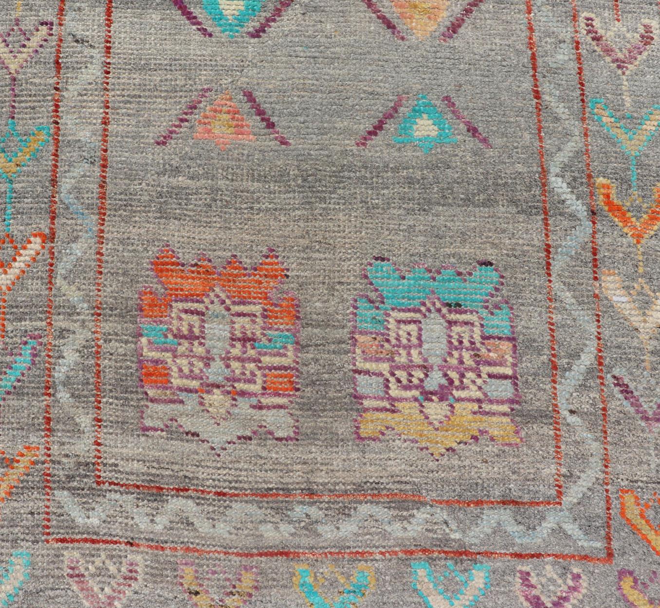 Modern Runner with Tribal Motifs in Warm Gray Background and Vivid Multi Colors In Excellent Condition For Sale In Atlanta, GA