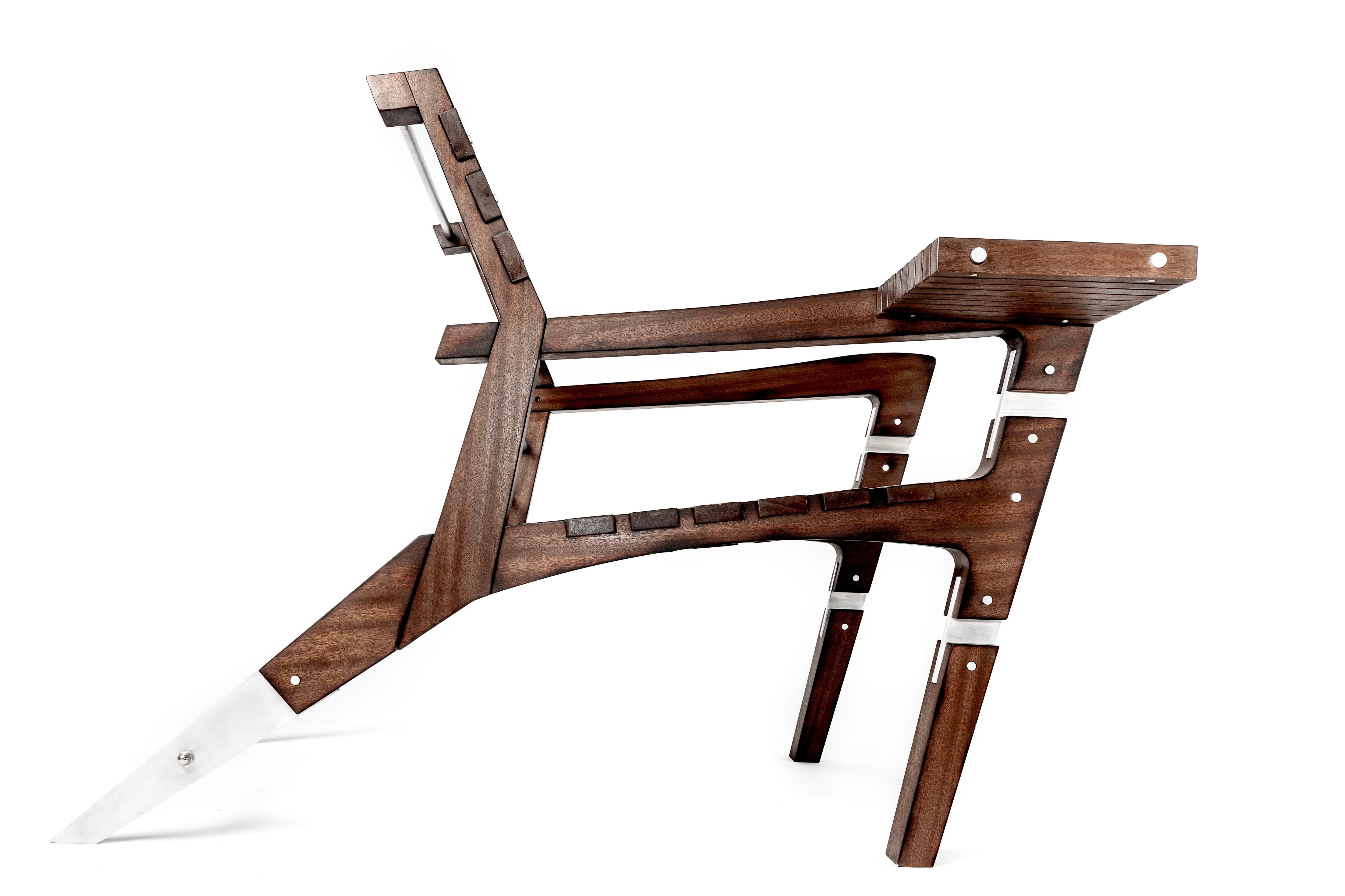 This chair designed and built by Wes Walsworth has a vintage yet futuristic feel. The unique joinery of fine mahogany and aluminum sets this chair apart from the rest. The chair is as comfortable as it is cool. Suited for outdoor use the chair also