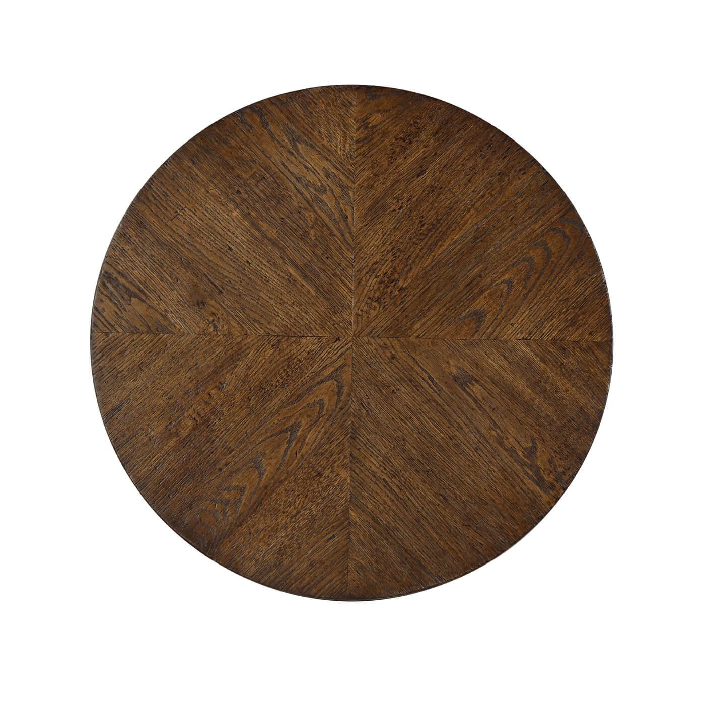 A modern rustic oak round end table with a geometrically arranged oak pattern on the round top. This beautiful table is crafted with a flat truss oak stretcher and a tapered oak leg.

Shown in Dusk finish
Dimensions
22