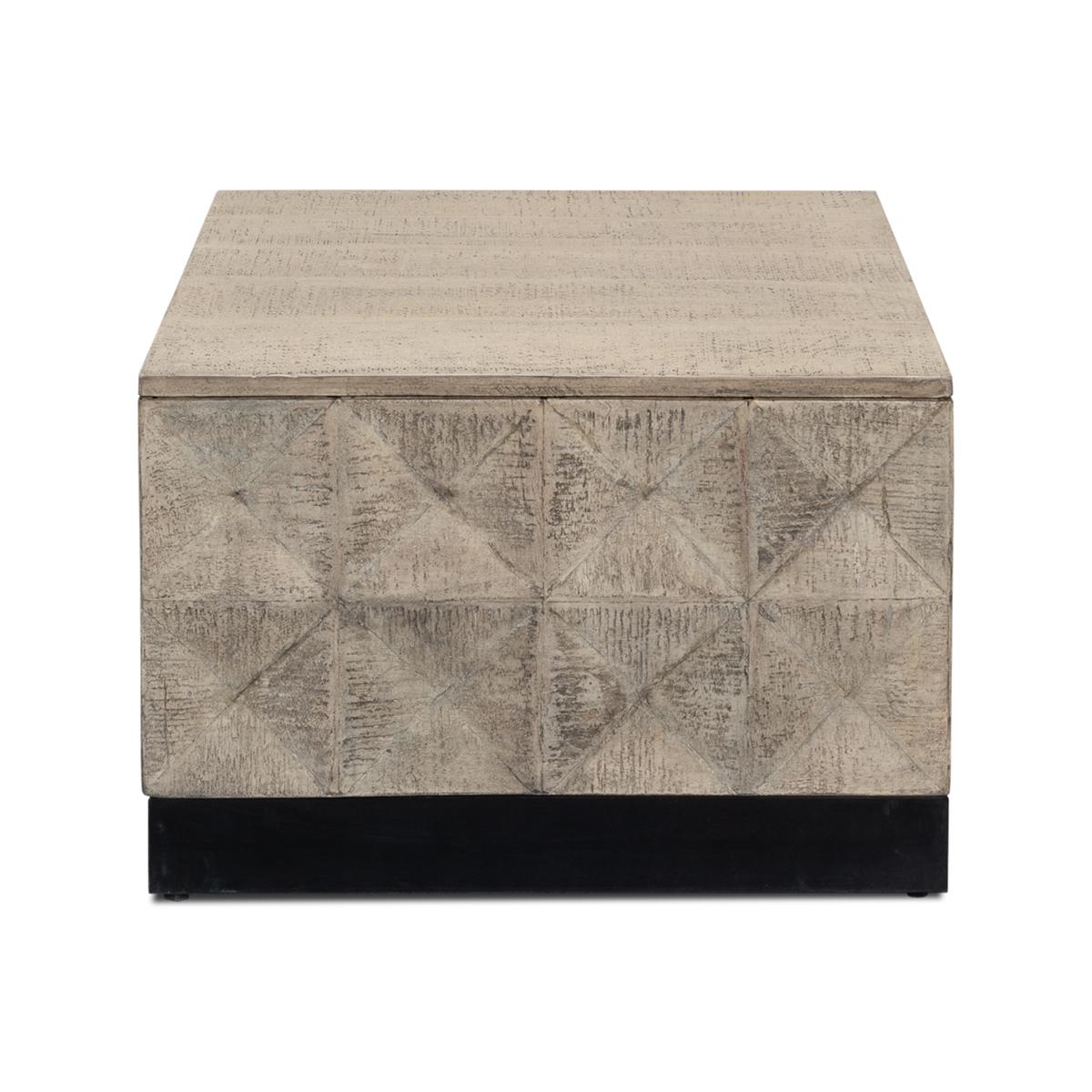 Modern rustic square coffee table in a grey eclectic finish on mango wood, with geometric patterns to the sides and raised on an iron plinth base.

Dimensions: 24
