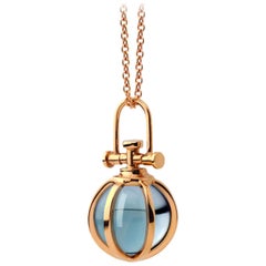 Modern Sacred 18 Karat Gold Crystal Orb Amulet Necklace with Natural Blue Topaz