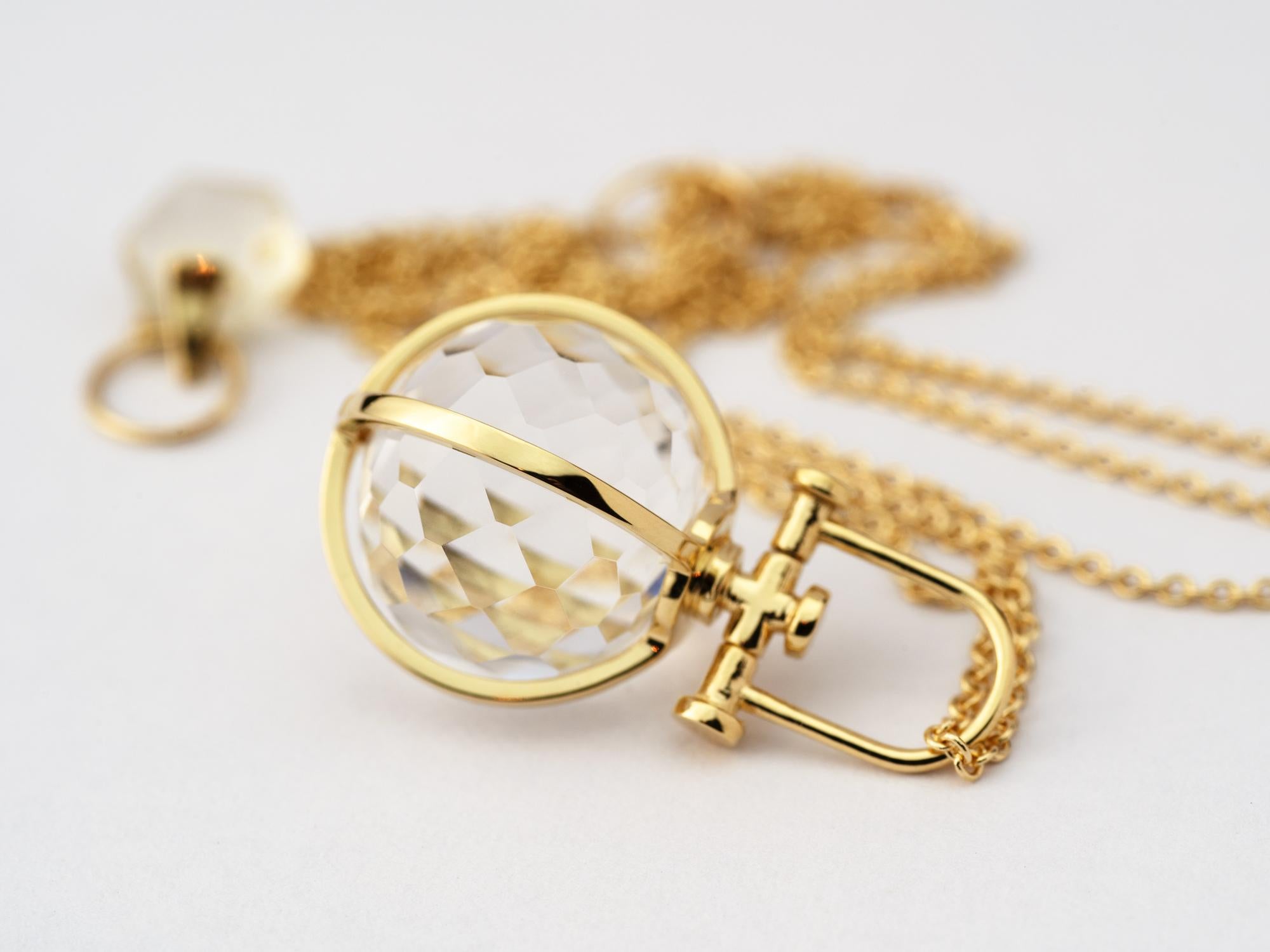 Rebecca Li designs mindfulness. 
This small crystal orb necklace is from her Crystal Ball Collection.
Rock Crystal is considered to be master healer stone. It means manifestation, positivity and luck.

Pendant:
Metal Type: 18K Yellow Gold
Gemstone: