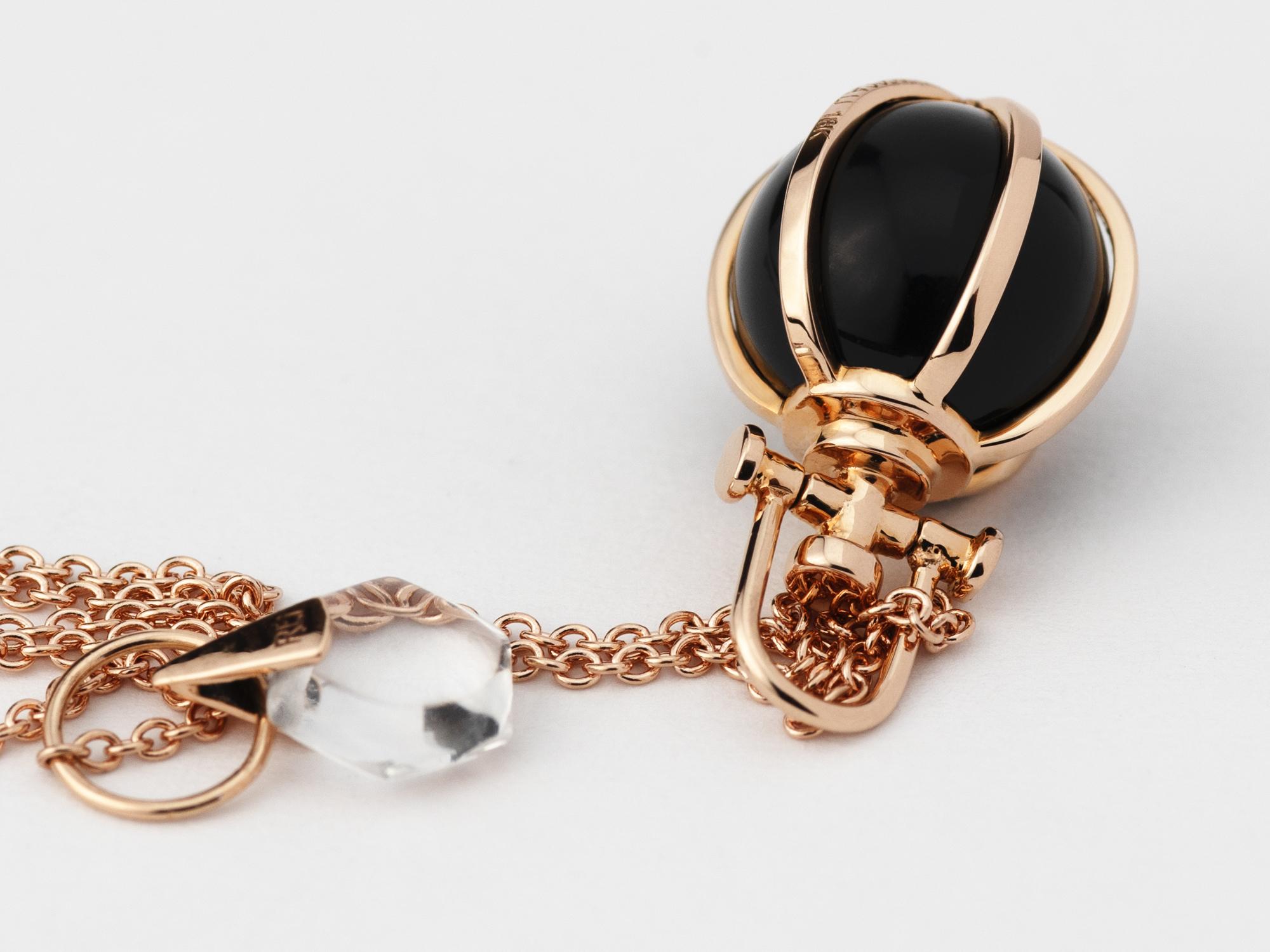 Rebecca Li designs mindfulness. 
This dainty orb necklace is from her Crystal Ball Collection.
Black Onyx means Protection & Luck.

Pendant:
Metal Type: 18K Rose Gold
Gemstone: Black Onyx
Pendant Size: 10 mm W * 10 mm D * 18 mm H
Gemstone Size: 8 mm