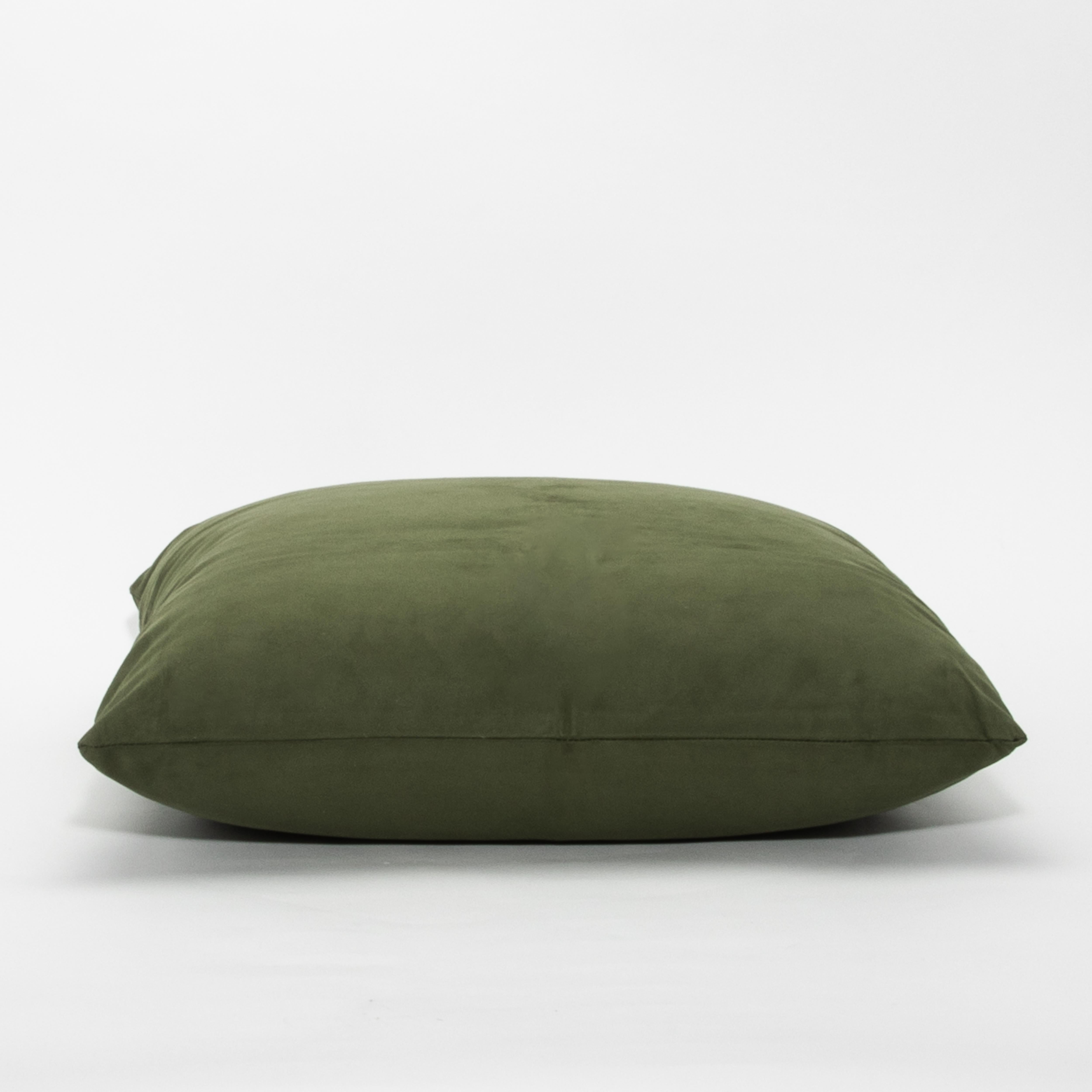 Elevate your living space with the Modern Sage Suede Decorative Pillow by MOGUL, a perfect blend of elegance and comfort. The rich sage hue, reminiscent of serene natural landscapes, adds a sophisticated yet soothing touch to any décor. Crafted from
