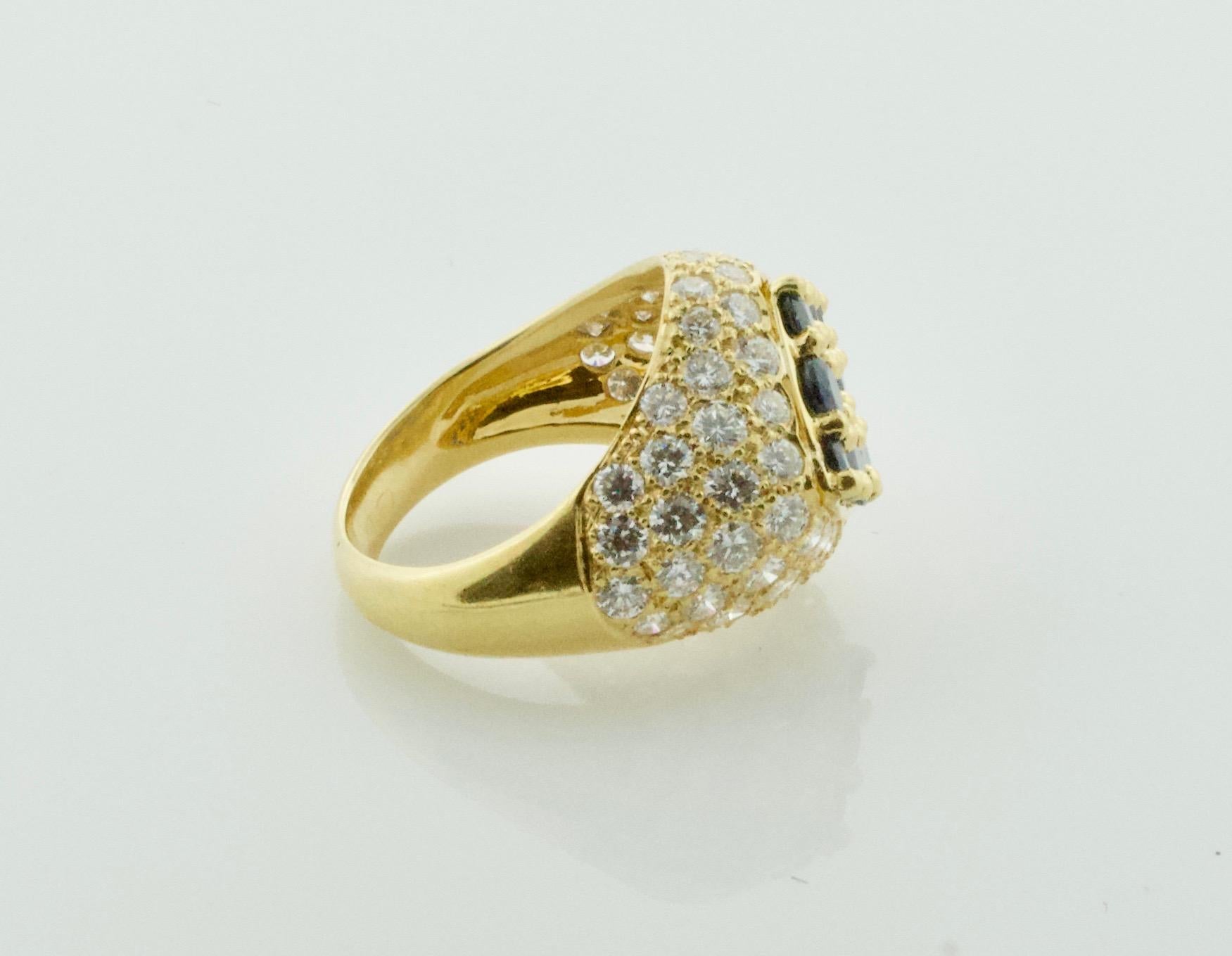 Modern Sapphire and Diamond Ring in 18k
in The Style odofRenowned Italian Designers
Nine Round Cut Deep Blue Sapphires Weighing .80 Carats Approximately [bright with no imperfections visible to the naked eye]
Sixty Two Round Brilliant Cut Diamonds