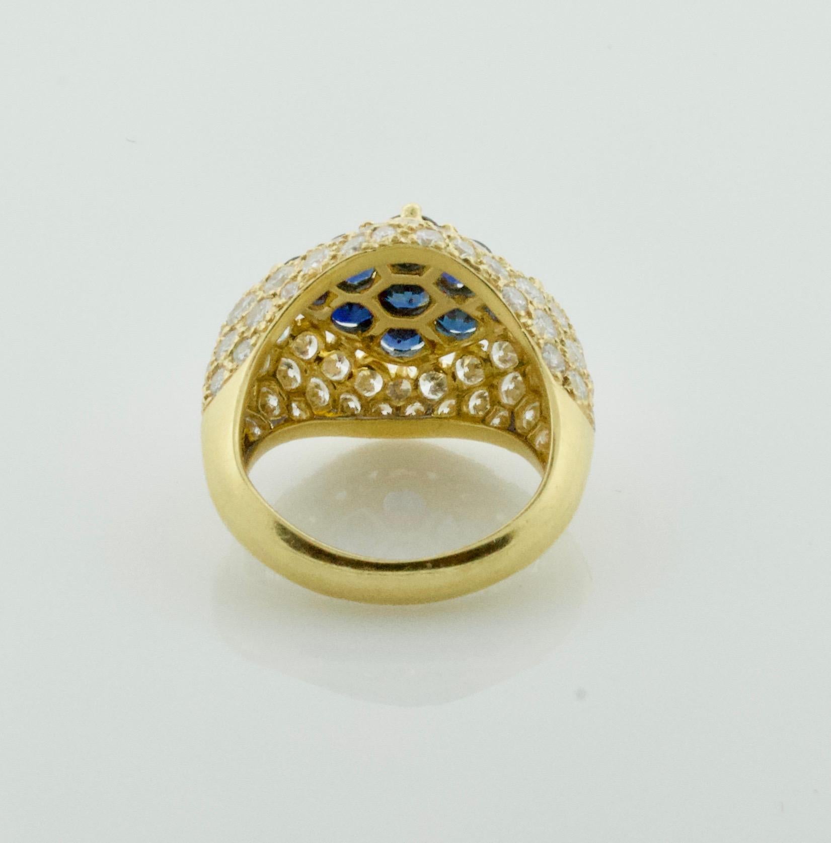 Round Cut Modern Sapphire and Diamond Ring in 18 Karat For Sale