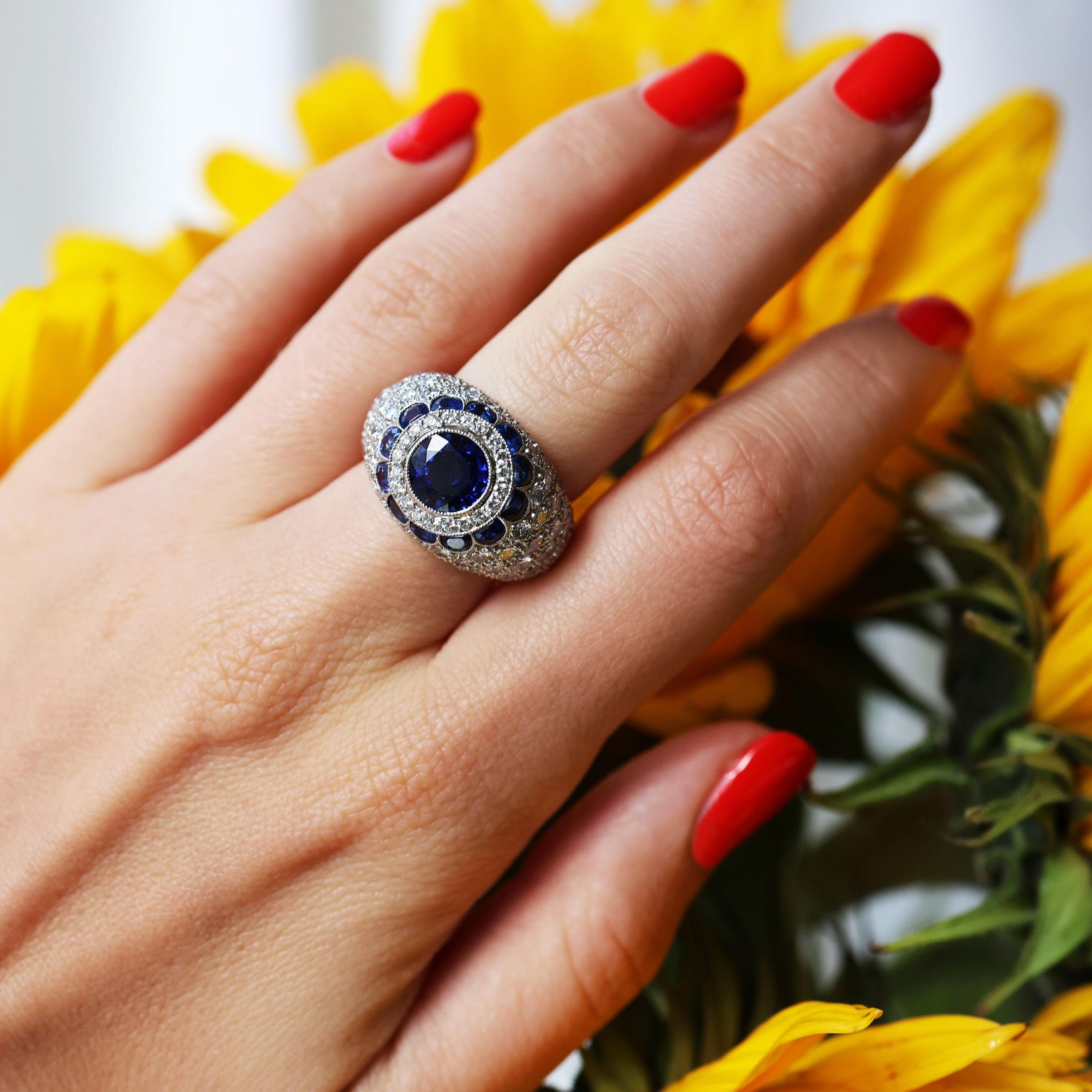 Round Cut Modern Sapphire Diamond and Platinum Bombé Ring For Sale