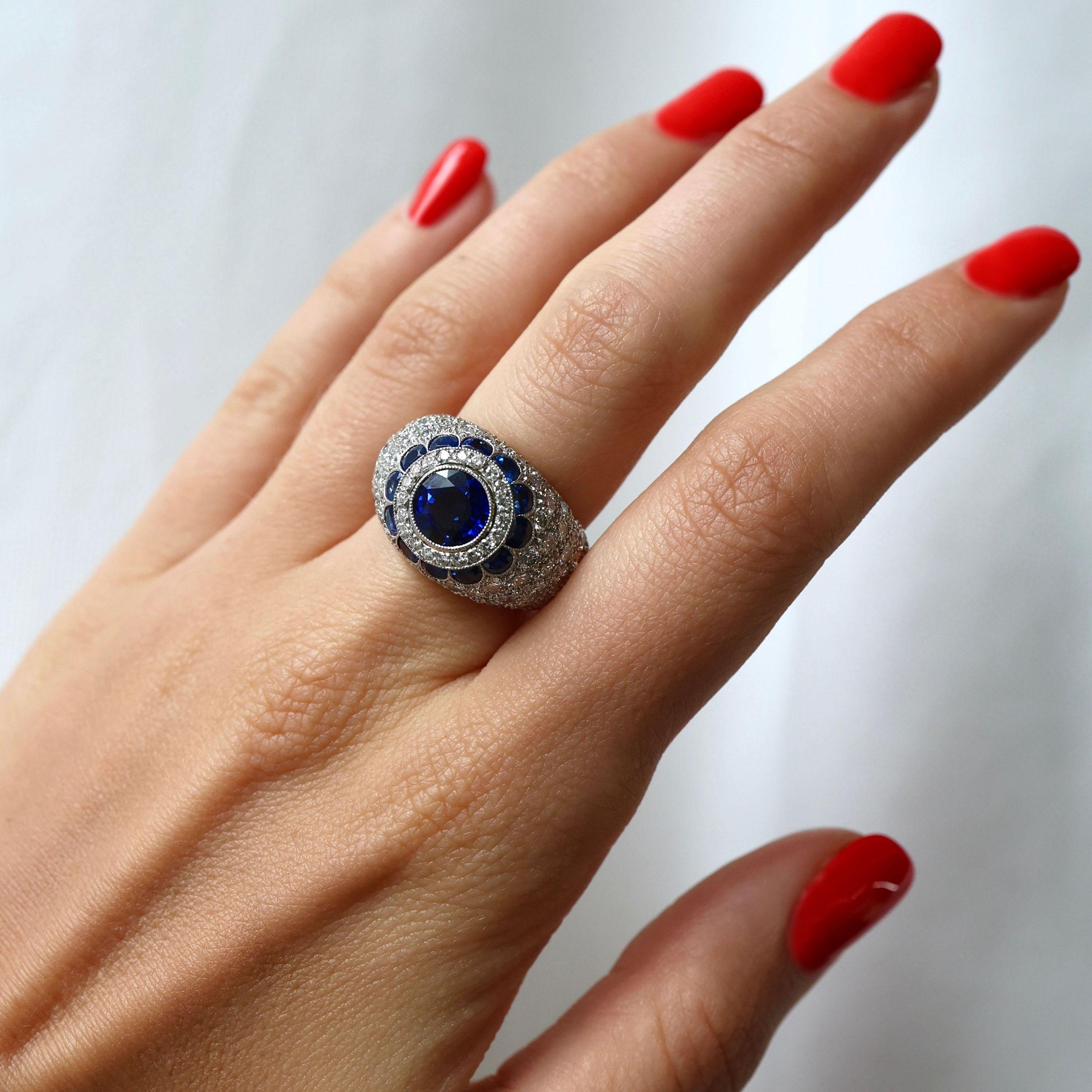 Women's Modern Sapphire Diamond and Platinum Bombé Ring For Sale