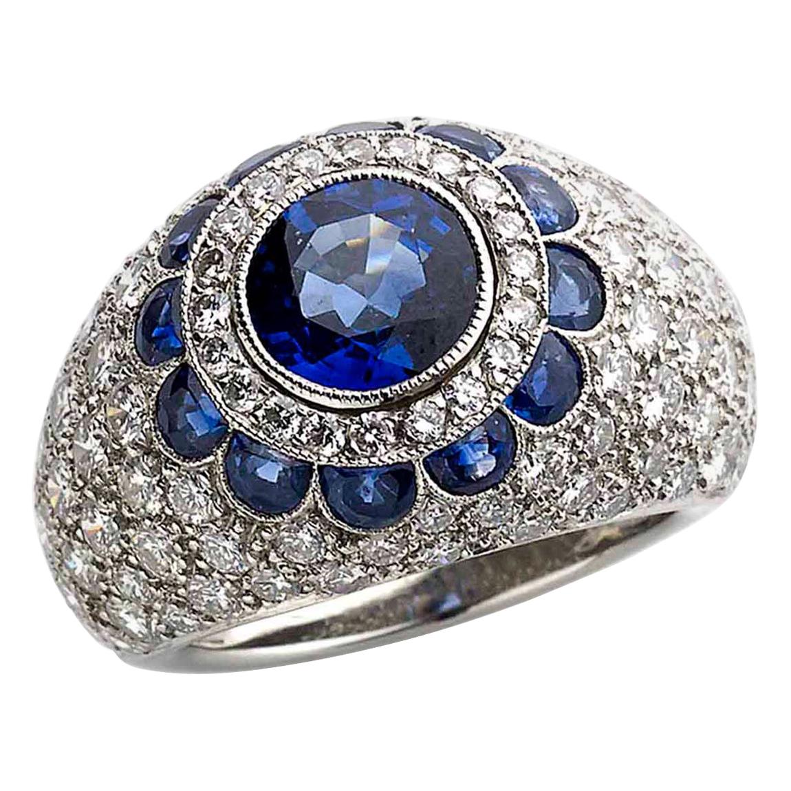 Modern Sapphire, Diamond and Platinum Bombé Ring For Sale