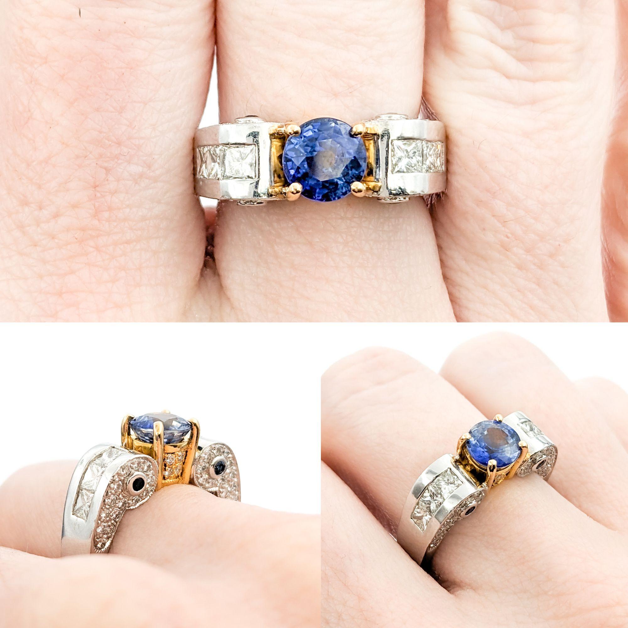 Modern Sapphire & Diamond Ring - 18K Gold

This beautiful ring is crafted in 18kt white and yellow gold and features a 1.37ct round-cut sapphire and 1.00ctw princess and round brilliant-cut diamonds, VS2-SI1 clarity and H color. This ring is size 6