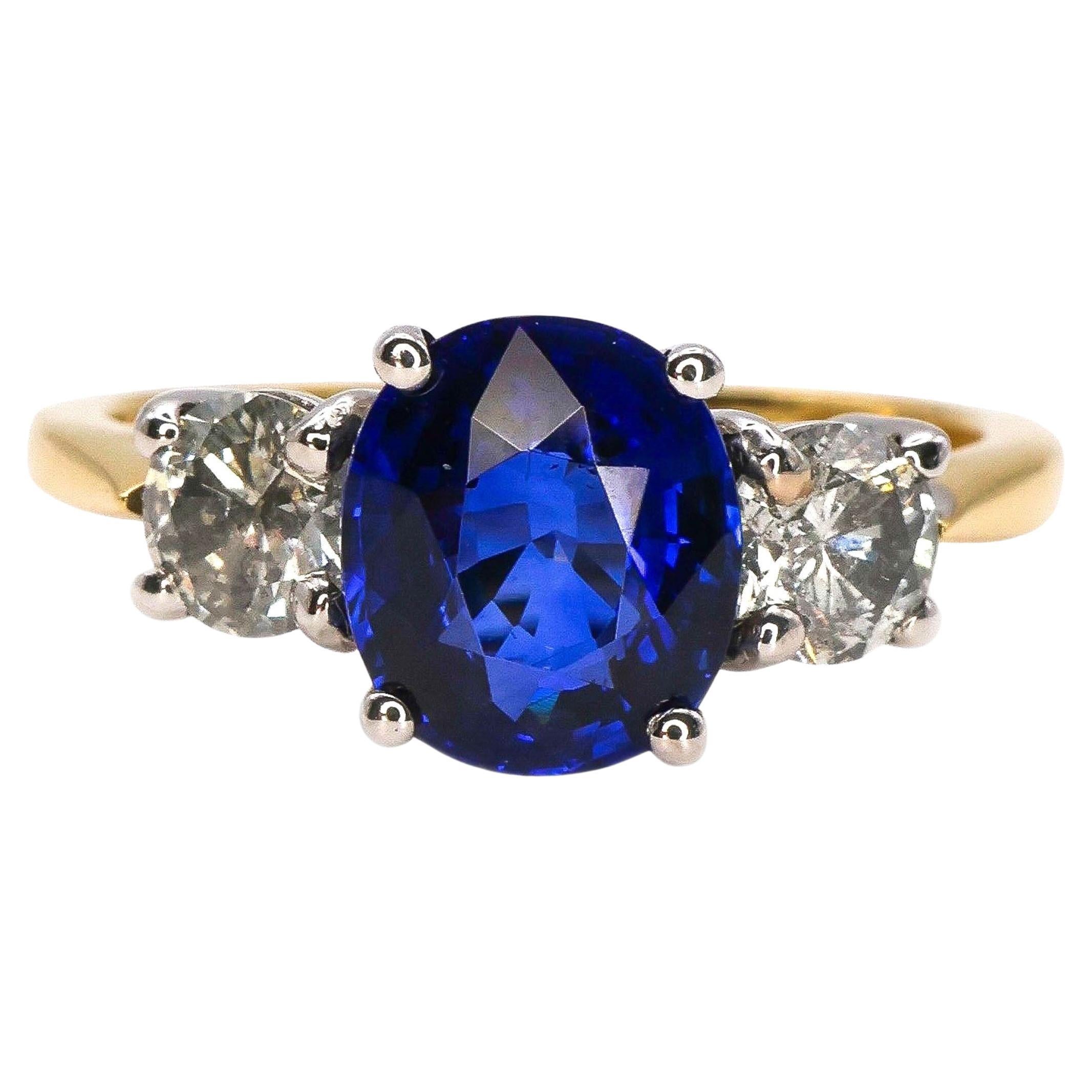 Modern Sapphire, Diamond, Yellow and White Gold Three Stone Ring, 1.93 Carats