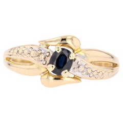 Modern Sapphire Diamonds 18 Karat Yellow And White Gold Bangle Ring