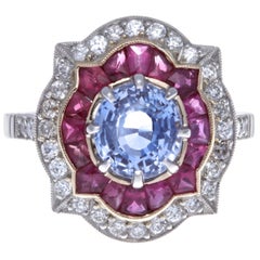 Bague moderne en saphir:: rubis et diamant en platine