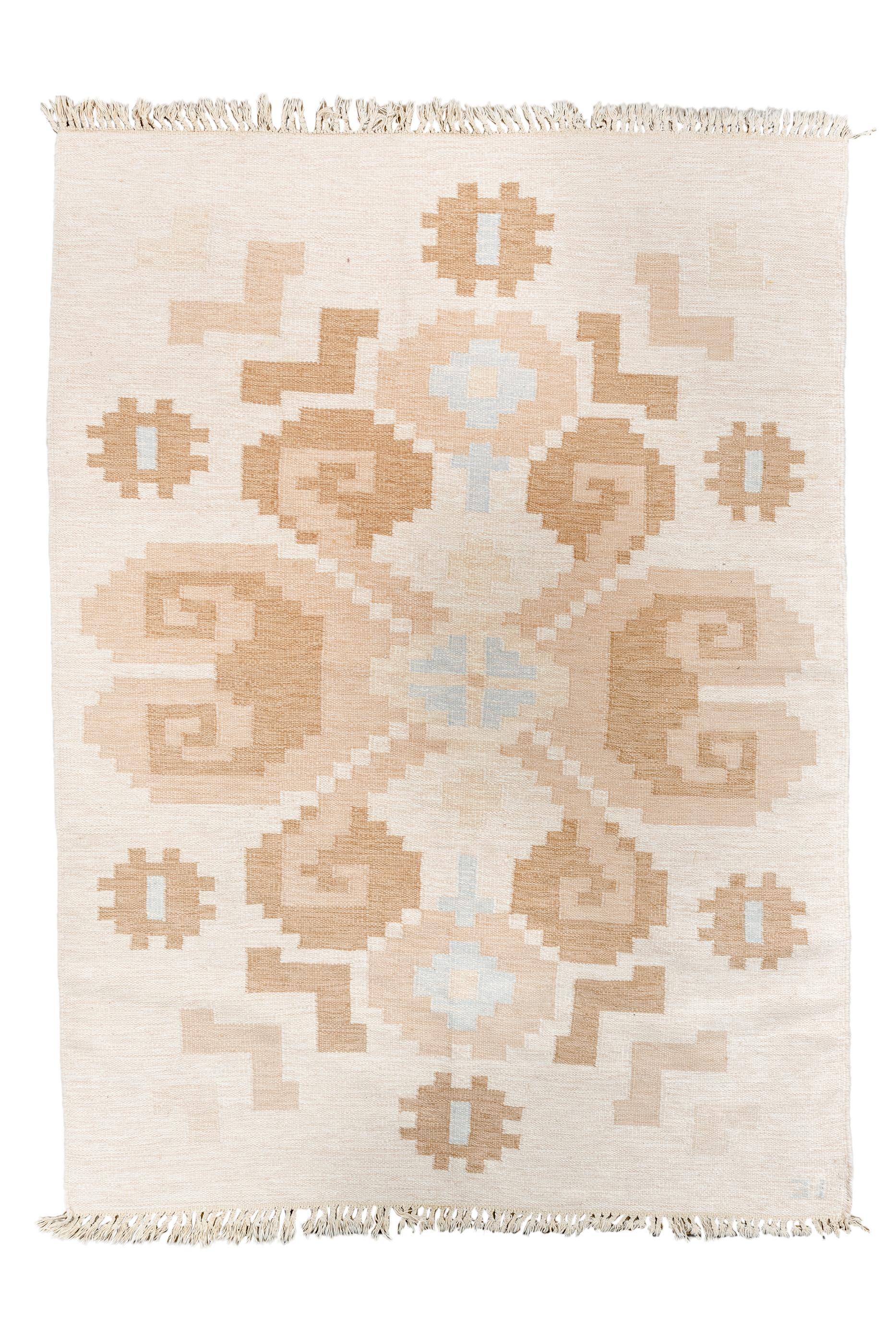 The borderless, cream field shows a charmingly unbalanced central motif of stepped curled leaf style elements, abstract depicting V-shaped flowers, with secondary cross-hatch elements.   The weavers started at the left and as they proceeded, they