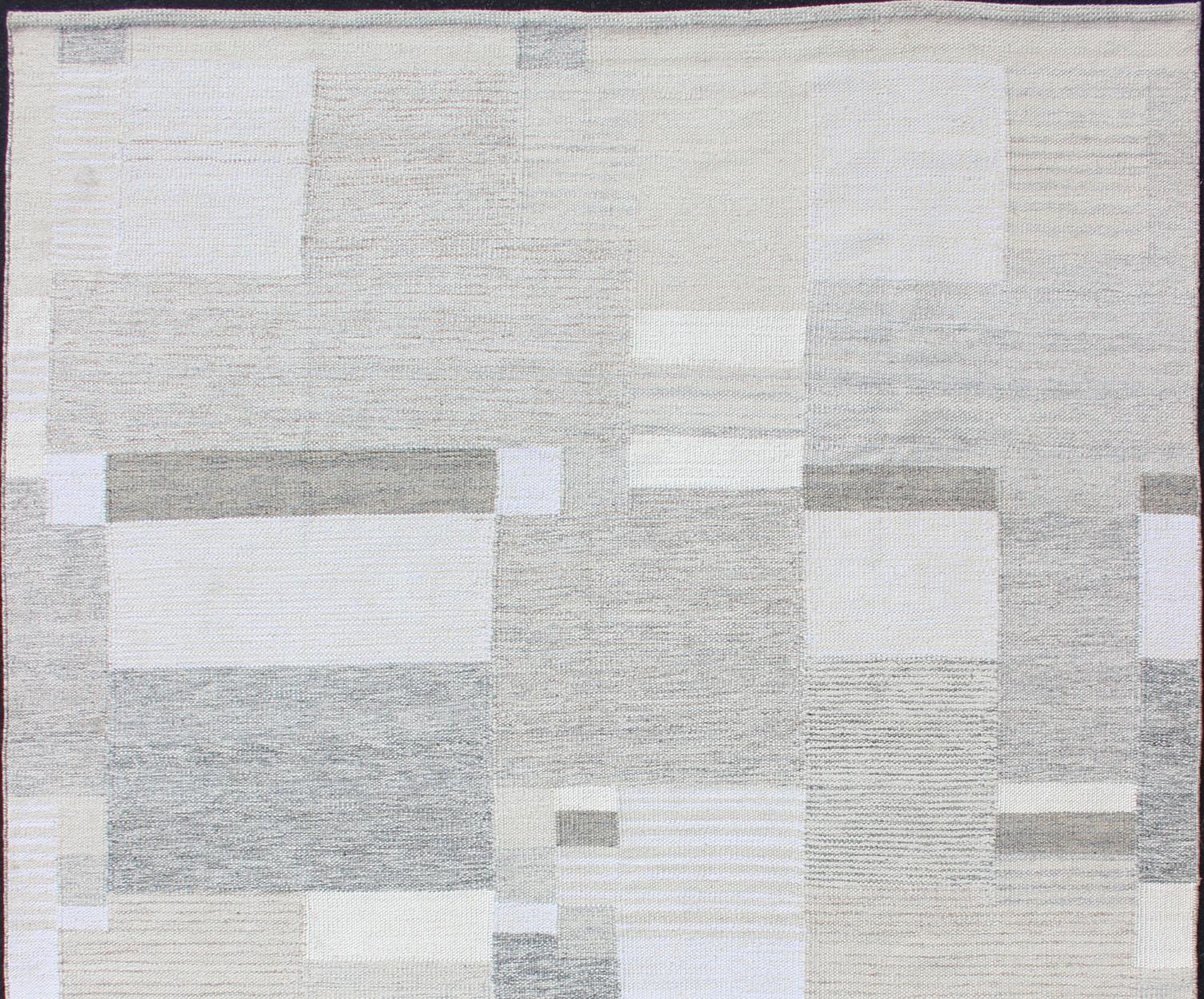 Gray, beige, light brown, white and cream modern design Scandinavian style flat-weave rug, rug rjk-20011-shb-004-02, country of origin / type: India / Scandinavian flat-weave.

This Scandinavian flat-weave style is inspired by the work of Swedish