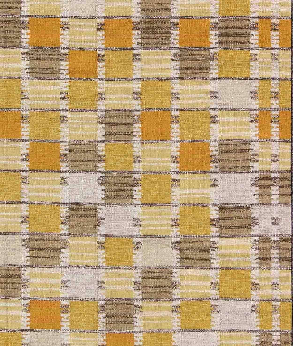 This Scandinavian design flat-weave patterned rug is inspired by the work of Swedish textile designers of the early to mid-20th century. With a unique blend of historical and modern design, this dynamic and exciting composition is beautifully suited