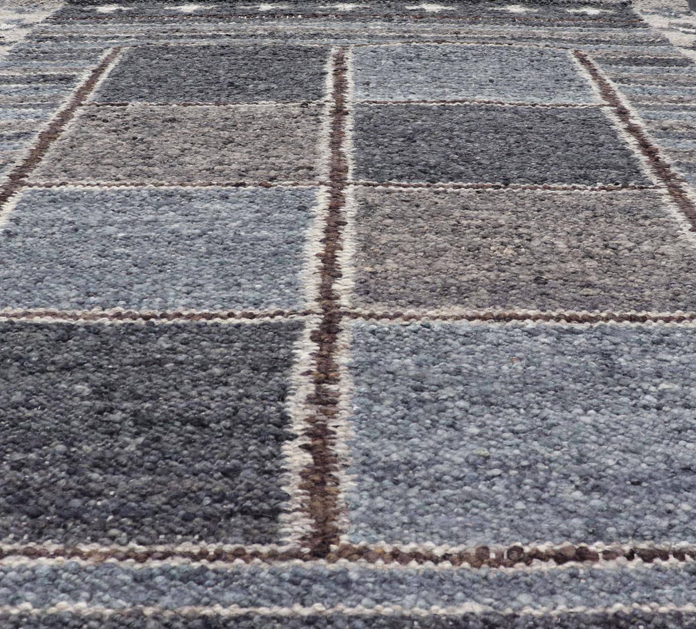 Modern Scandinavian/Swedish Design Rug in Blue, Charcoal, Gray and Cream. Keivan Woven Arts / rug RJK-26358-SHB-004-NU, country of origin / type: India / Scandinavian flatweave rug. 
Measures: 5'3 x 6'10 
This Scandinavian flat weave rug is inspired