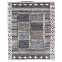 Moderner Teppich im skandinavischen/schweizerischen Design in Blau, Holzkohle, Grau und Creme