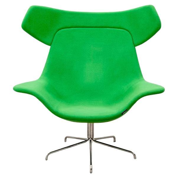 This Oyster High Swivel Chair is an example of modern Scandinavian design. Created by Michael Sodeau for Offect in the 2000's 
The Oyster is an elegant easy chair inspired by the Swedes’ love of shellfish. The name Oyster also suggests the idea of a