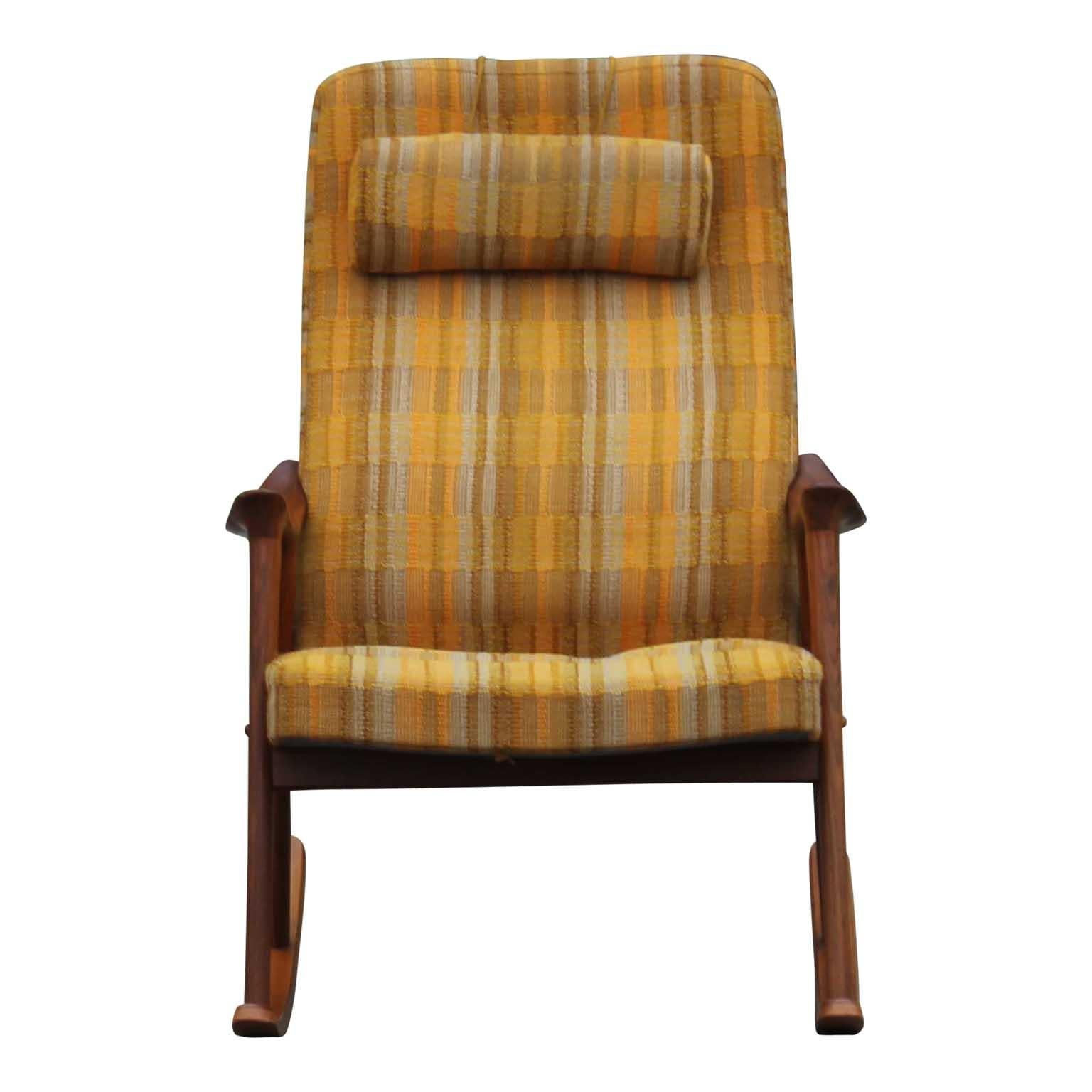 Modern Scandinavian Westnofa teak rocking chair by Ingmar Relling in original yellow pattern fabric, circa 1960s.