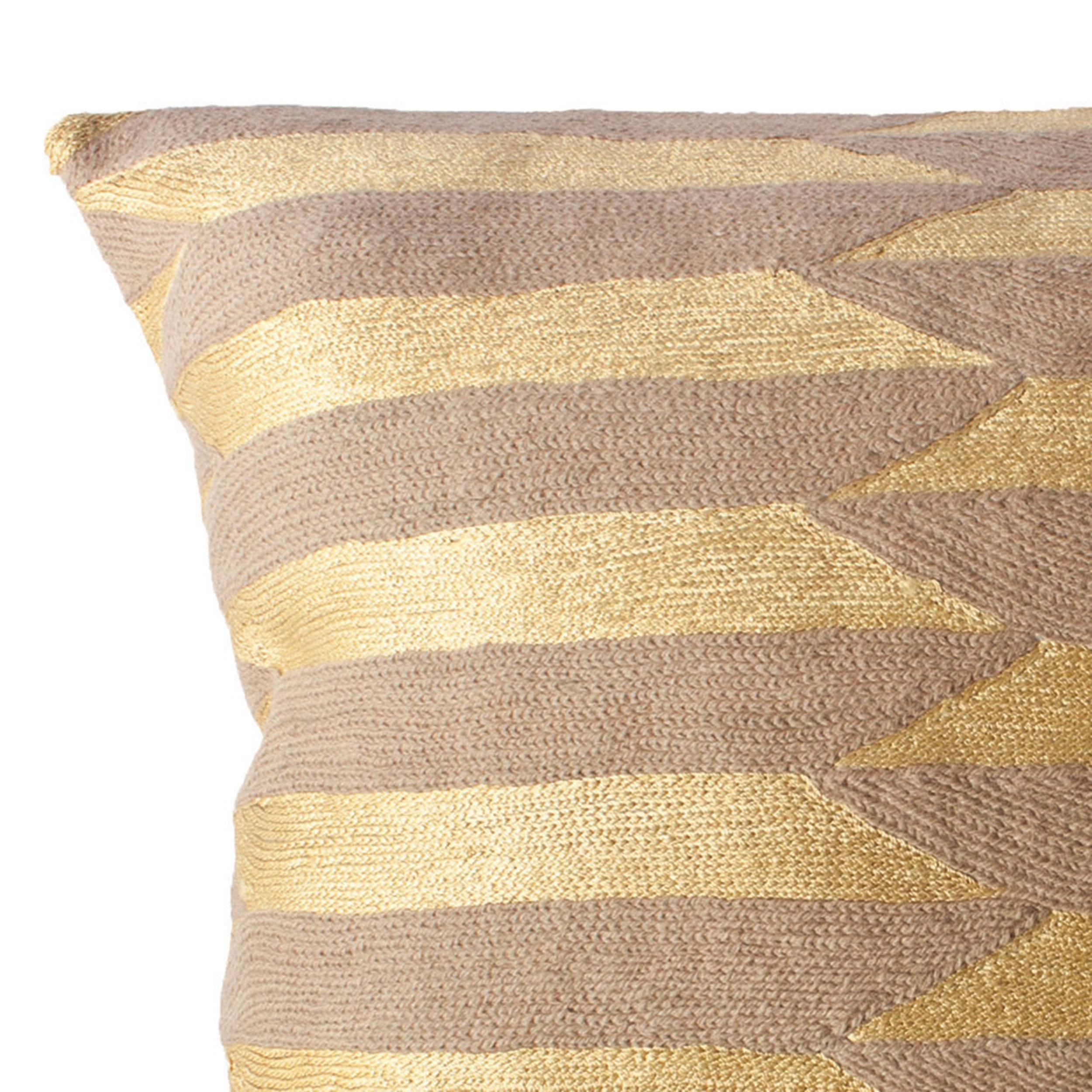 This striped throw pillow has been ethically hand embroidered by artisans in Kashmir, India, using a traditional embroidery technique which is native to this region.

The purchase of this handcrafted pillow helps to support the artisans and preserve