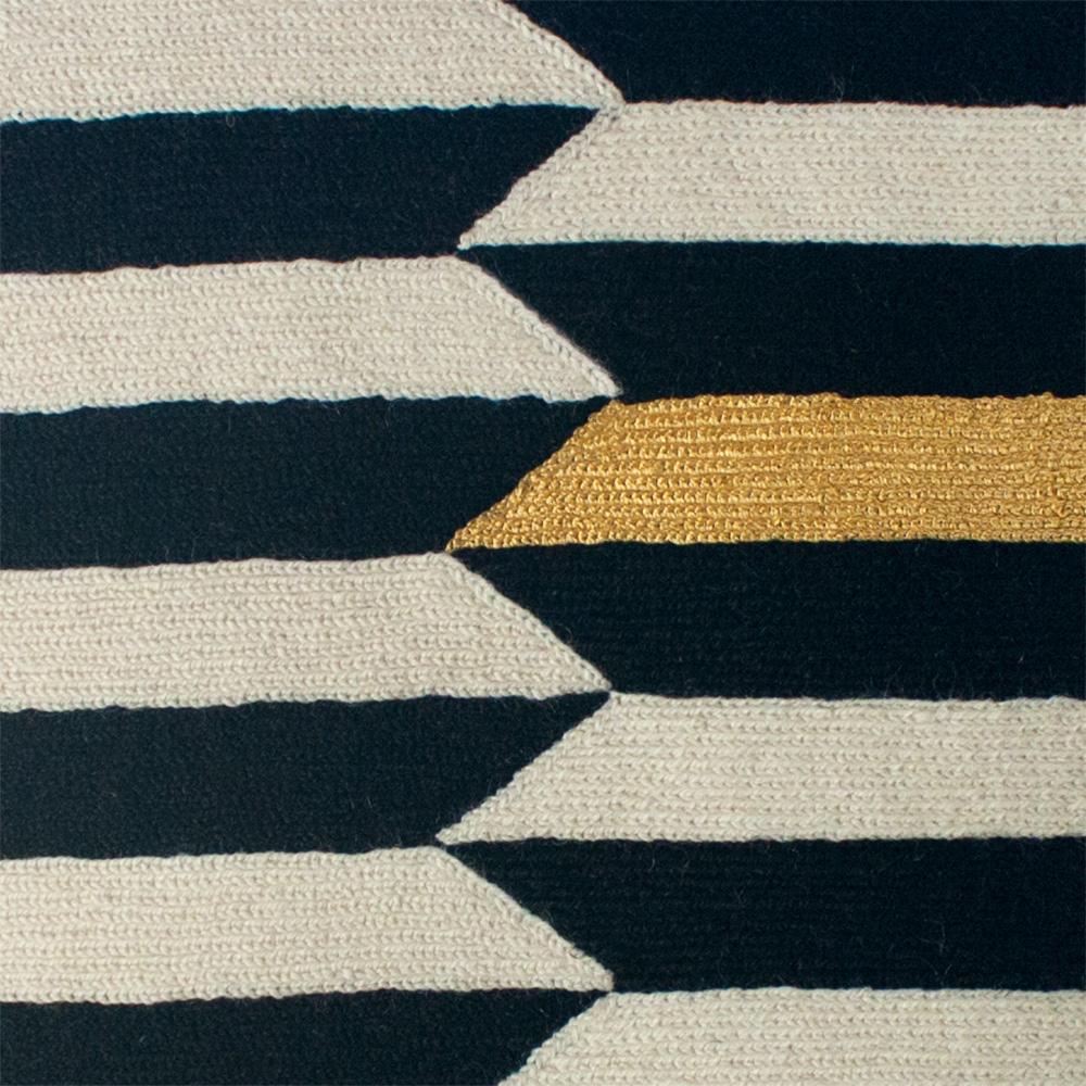 This striped throw pillow has been ethically hand embroidered by artisans in Kashmir, India, using a traditional embroidery technique which is native to this region.

The purchase of this handcrafted pillow helps to support the artisans and