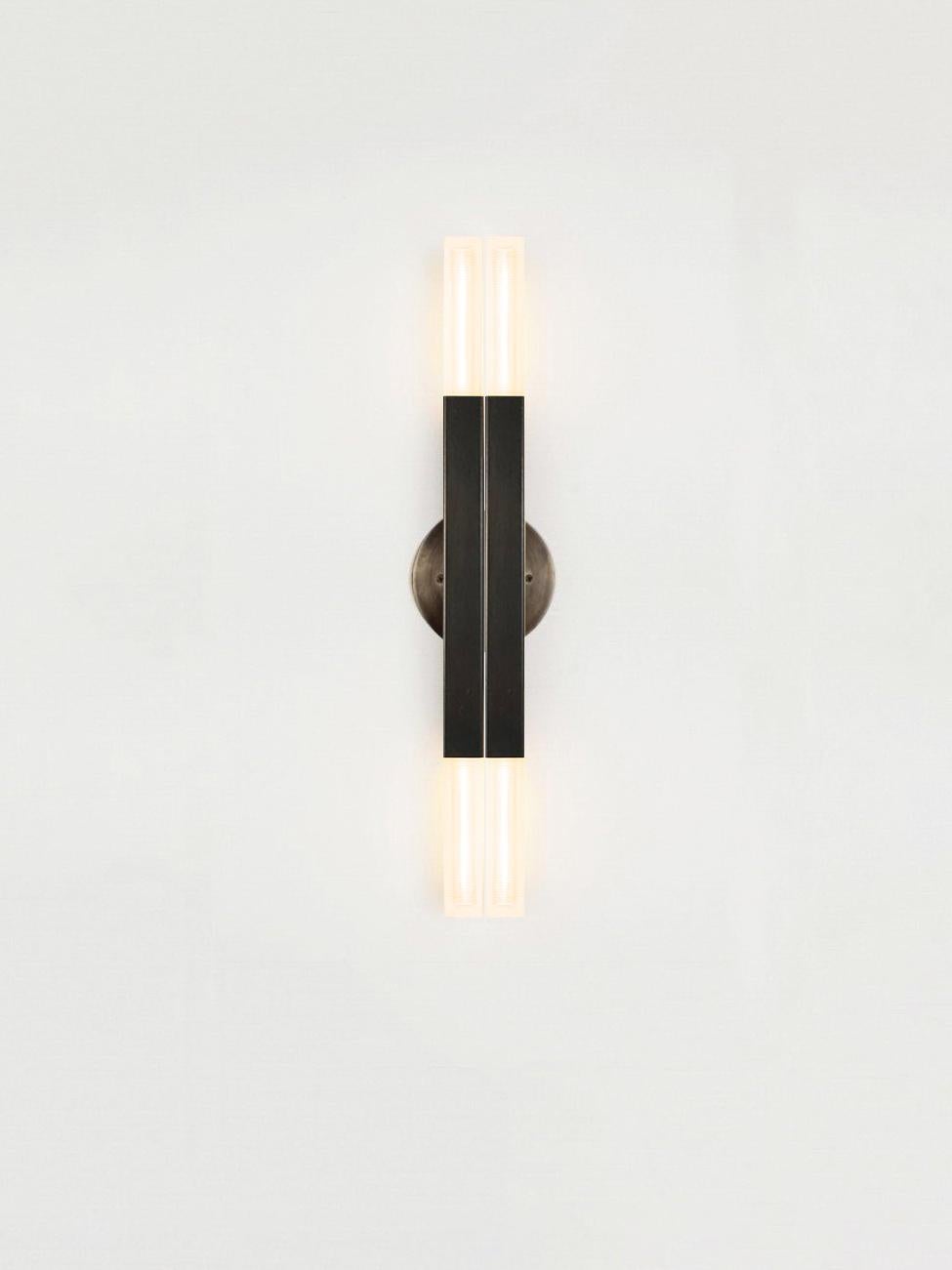 Daikon Studio  POST  KoKo Sconce-Large

The KoKo Sconce-Large celebrates the poetic dialogue between light and form to create a fixture that leans into the timeless and iconic. Meticulously crafted by hand in our studios. Horizontal or vertical