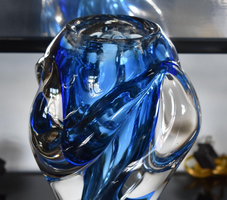 Sculptural hand blown Murano art glass vase in blue and clear tone.