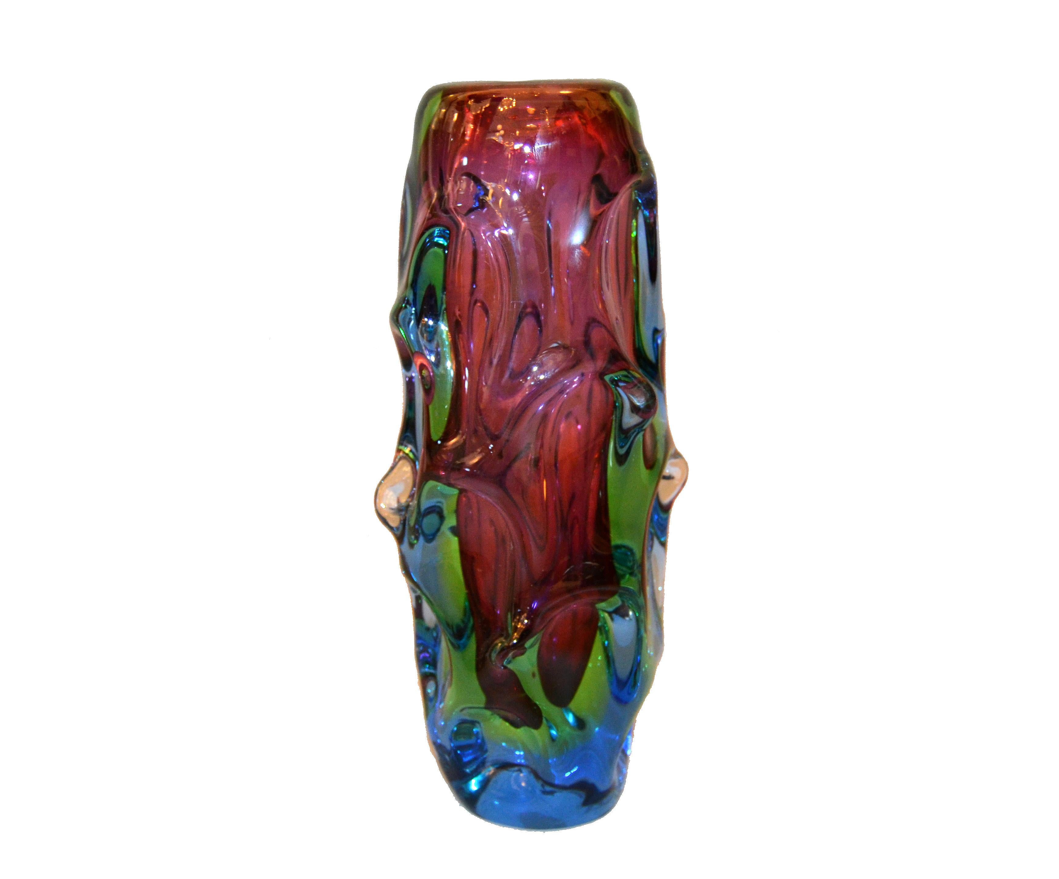 Elegant Italien sculptural hand-blown Murano art glass vase in dark pink, blue, green and clear tone.
The vase is very heavy.
Simply lovely.