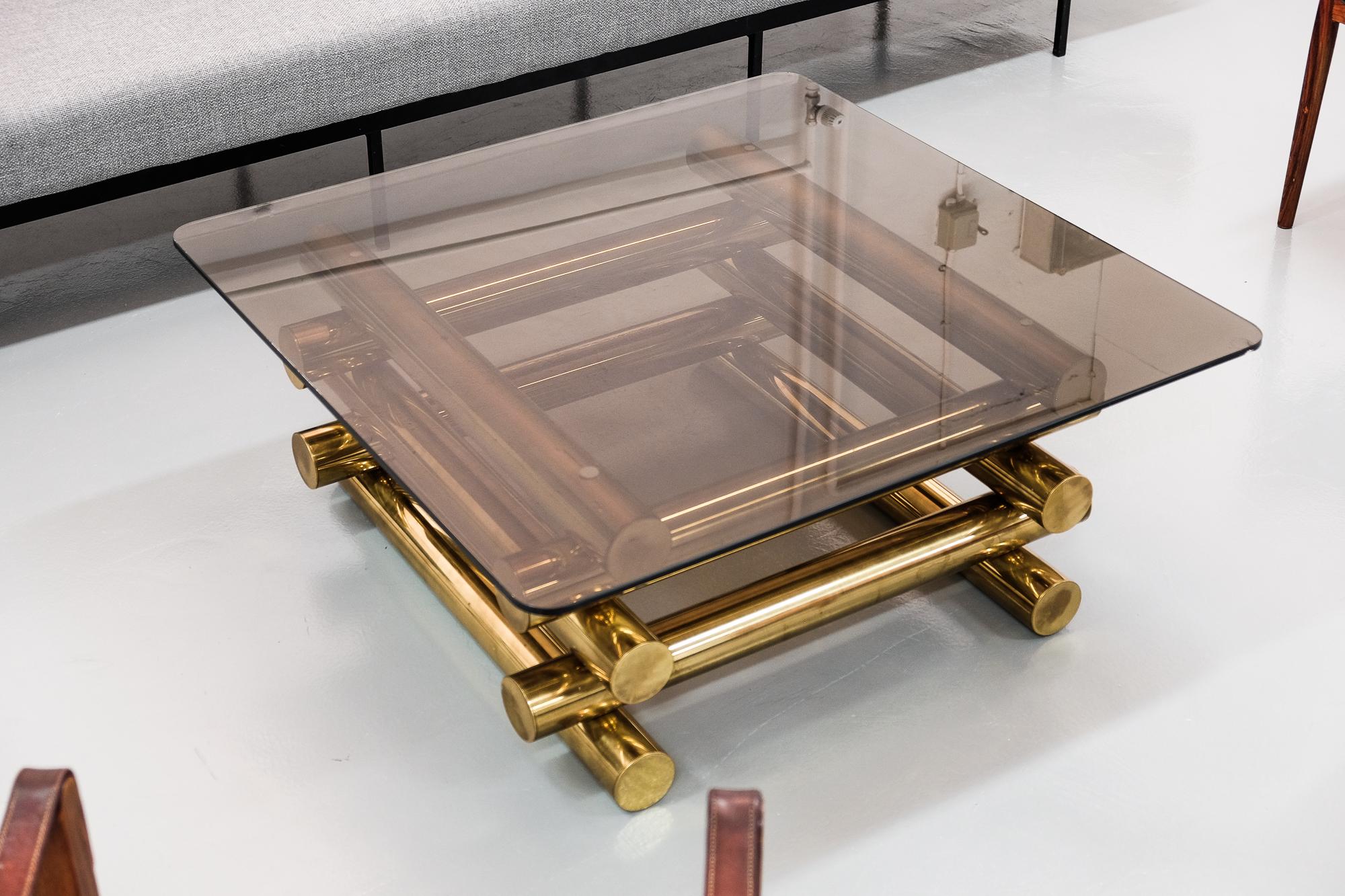 Modern Sculptural Stacked Brass and Smoked Glass Coffee Table, 1970s In Good Condition In Helsinki, FI