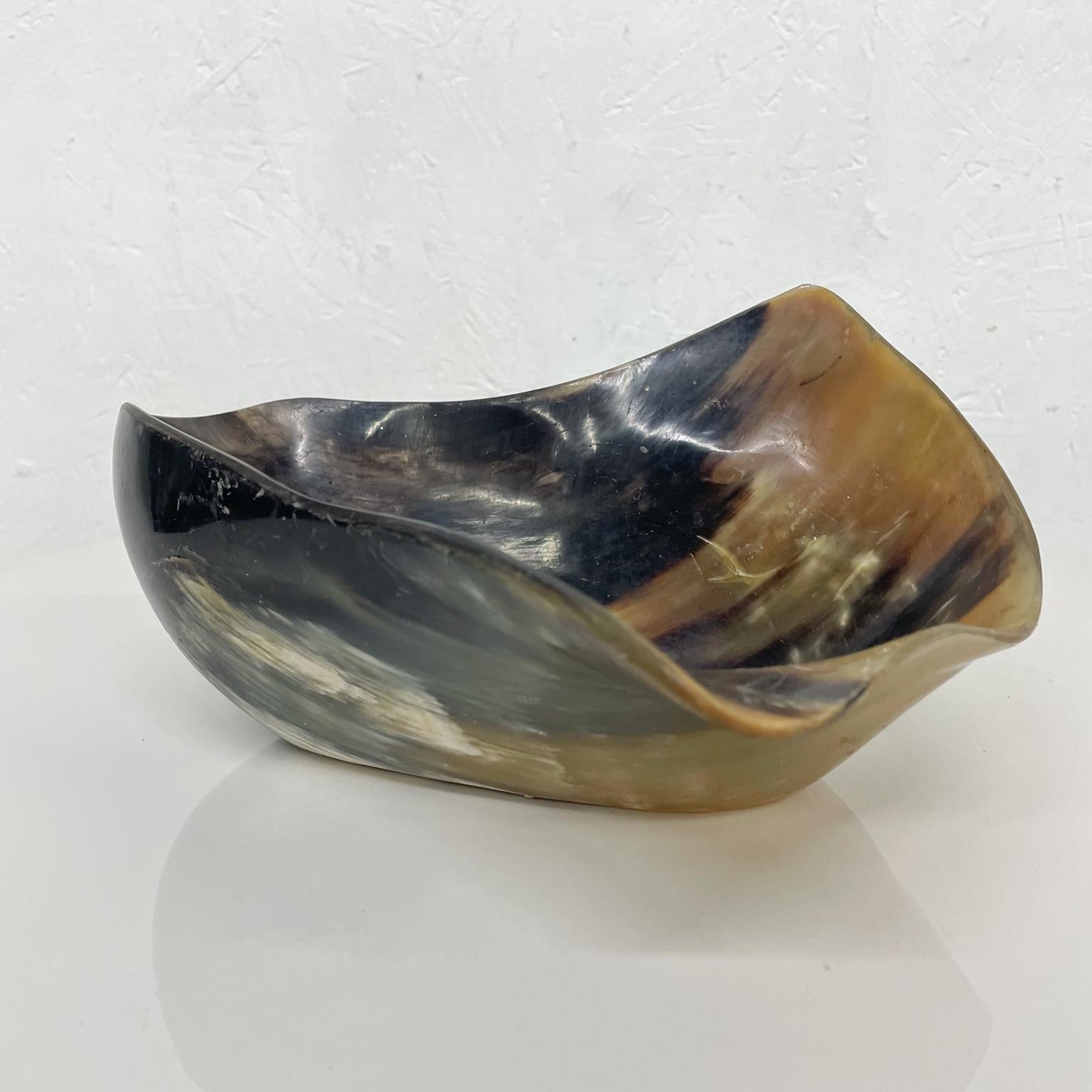 Sculptural Horn Bowl 1950s Austria
Unmarked
4.75 H x 9.75 D x 8.5 inches
Unrestored Vintage preowned condition Wear use & patina present. 
Not perfect, it is vintage.
Refer to images provided.


