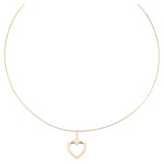 Modern Second Hand 18 Karat Yellow Gold Heart Pendant Torque Necklace