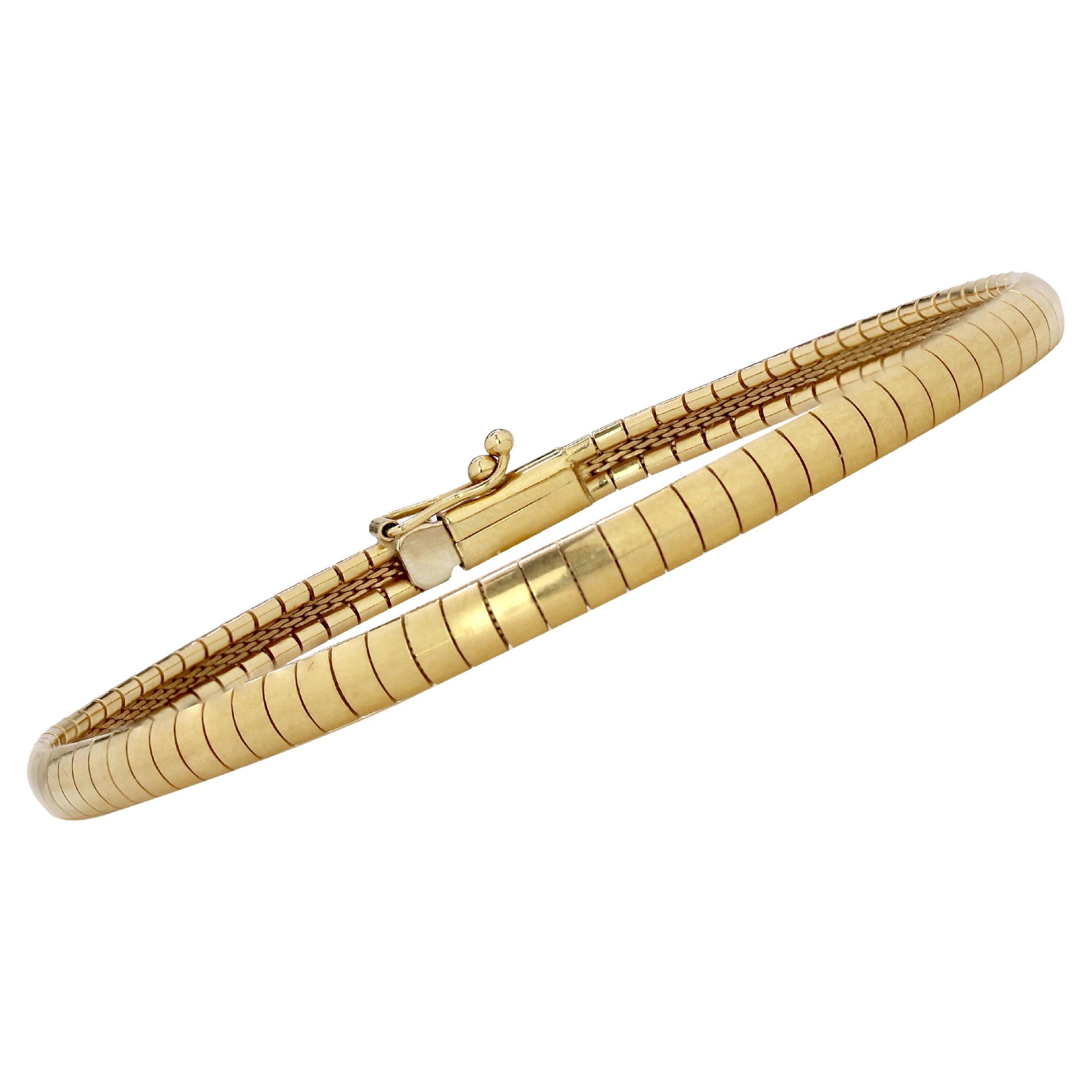 Bracciale Omega moderno di seconda mano in oro giallo 18 carati in vendita
