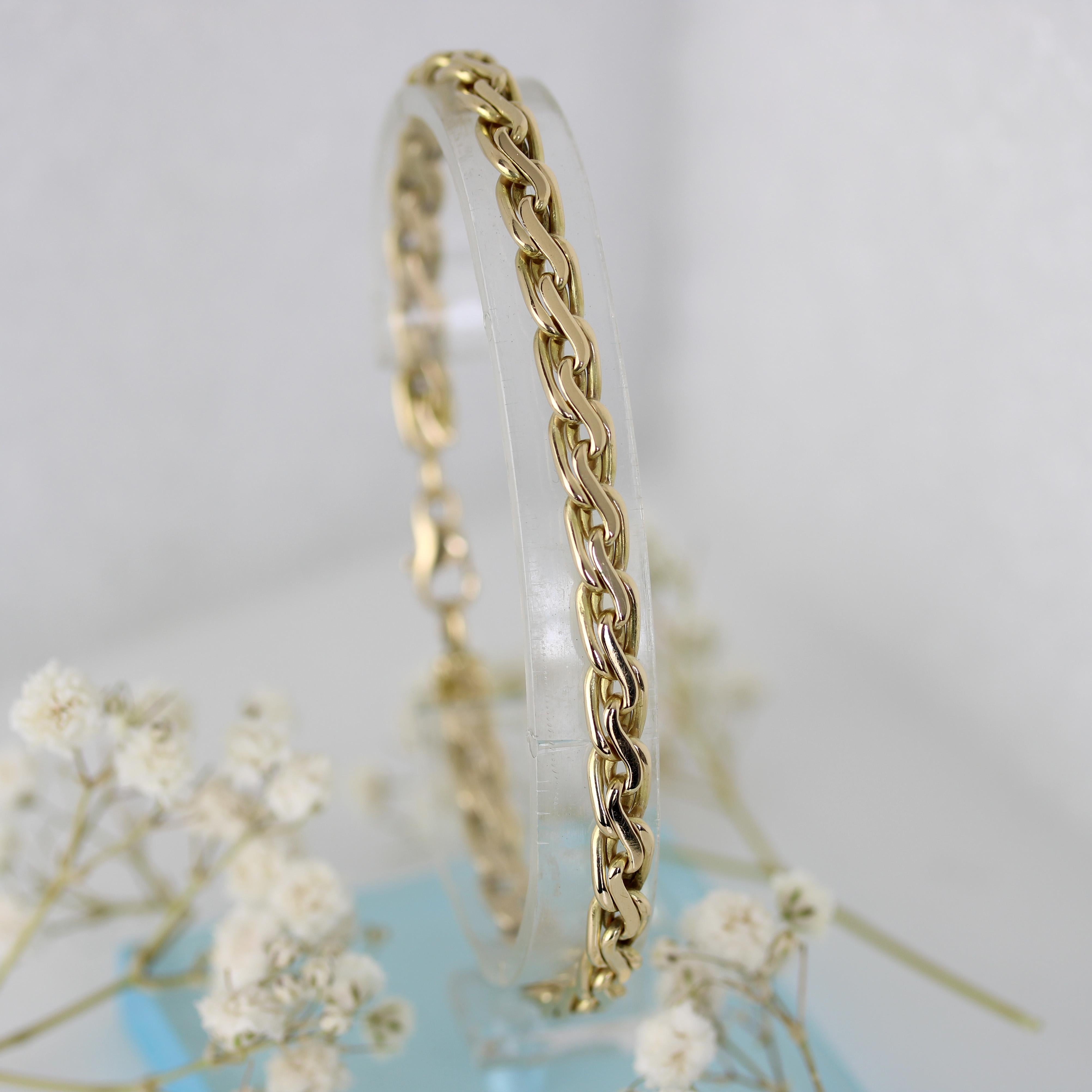 Modern Second-Hand 18 Karat Yellow Gold Oval Twisted Links Bracelet In Excellent Condition For Sale In Poitiers, FR