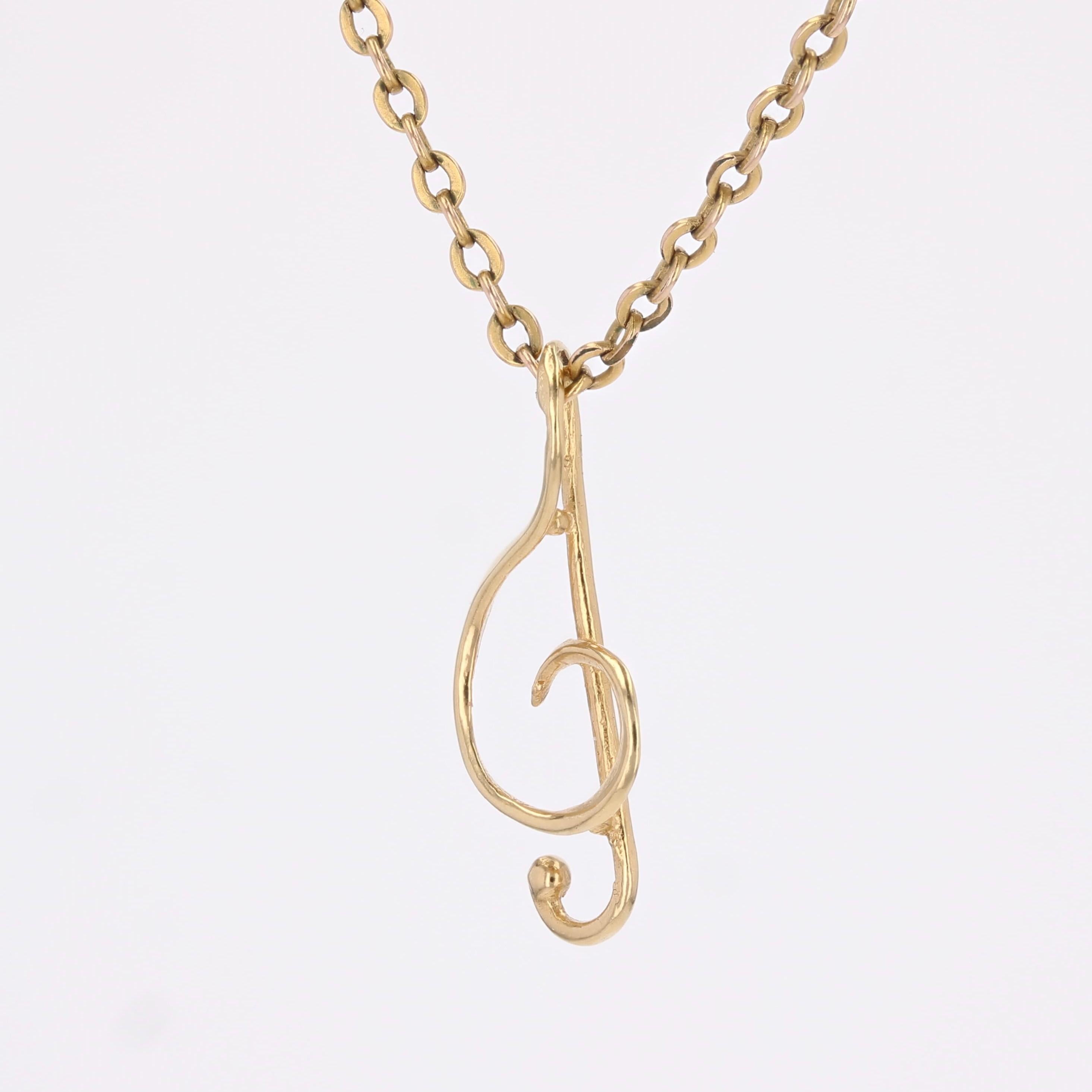 Pendentif moderne d'occasion en or jaune 18 carats avec breloque en forme de clé de sol Bon état - En vente à Poitiers, FR
