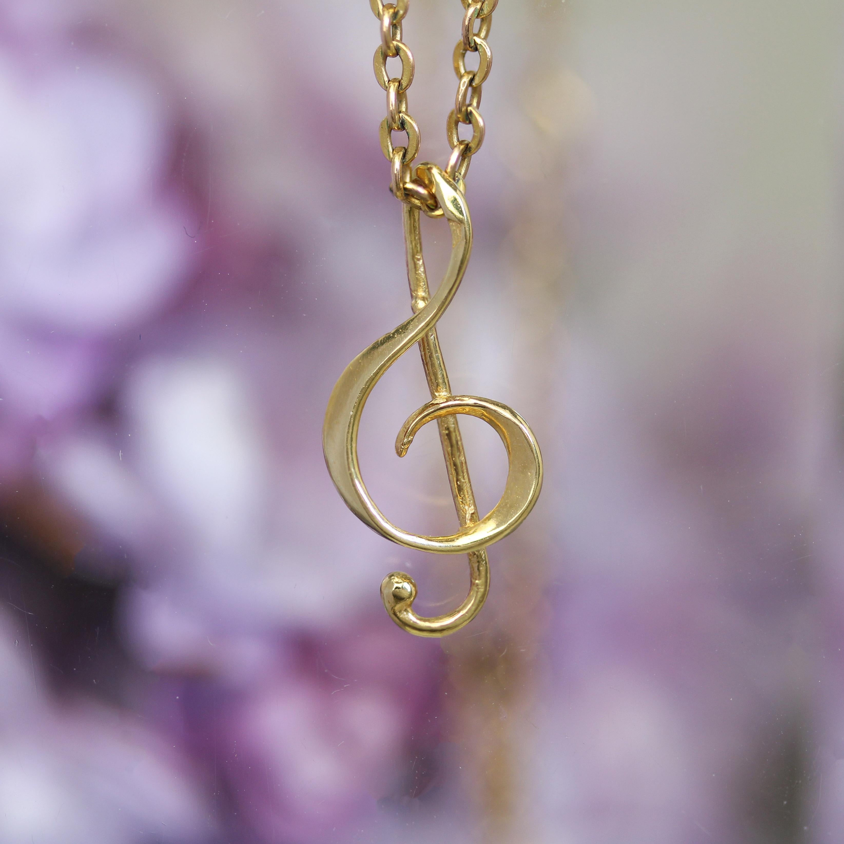 Pendentif moderne d'occasion en or jaune 18 carats avec breloque en forme de clé de sol Pour femmes en vente