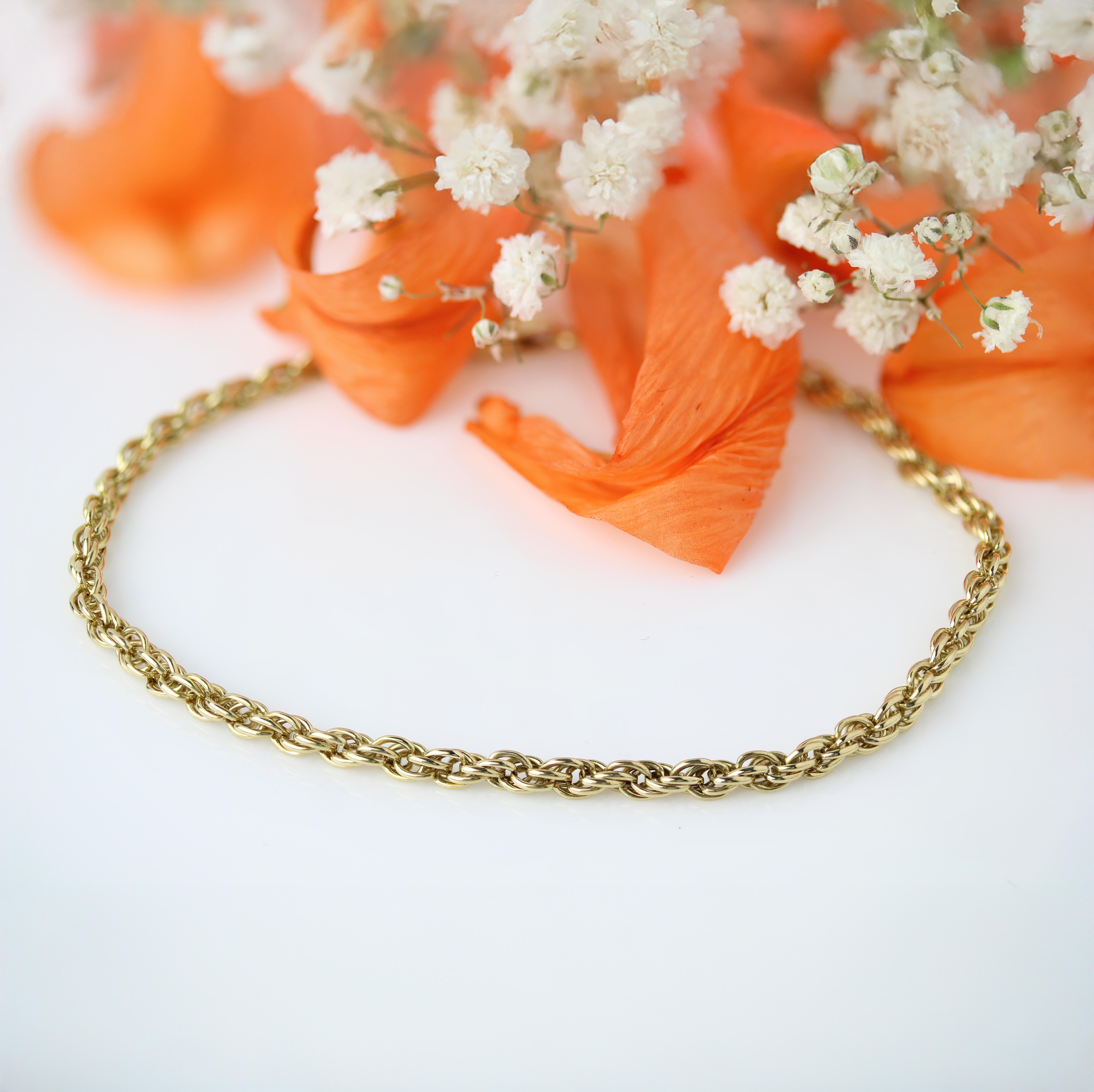 Moderne Bracelet moderne de seconde main à maillons torsadés en or jaune 18 carats en vente